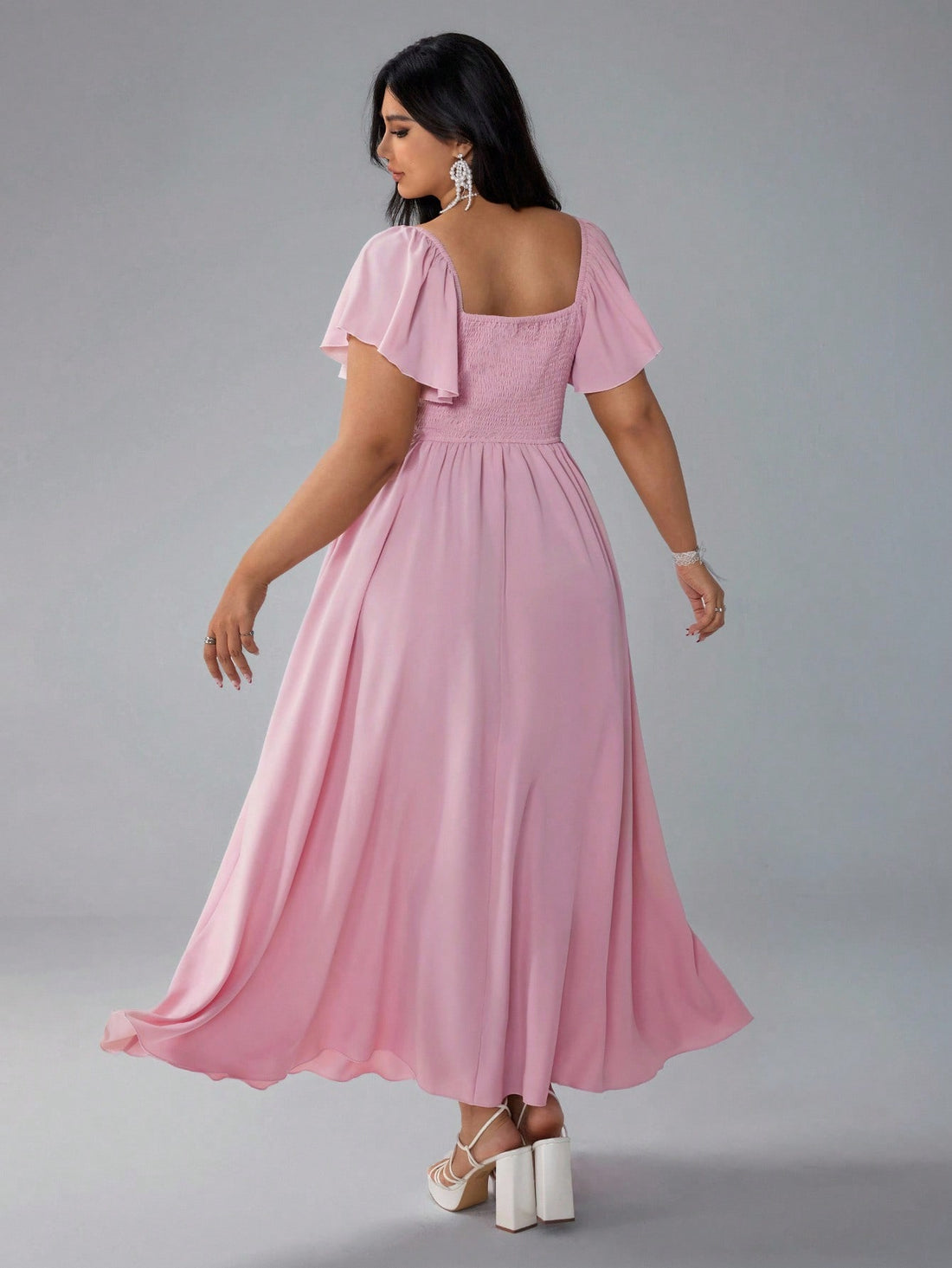 Step into summer with this Elegant Plus Size Maxi Dress, designed to flatter every curve. Featuring a draped neckline and playful flare sleeves, it combines comfort with a breezy, stylish vibe perfect for vacations. The flowing silhouette moves gracefully, making it your go-to dress for sunny days and warm evenings. Embrace effortless elegance and let your summer adventures begin in style!