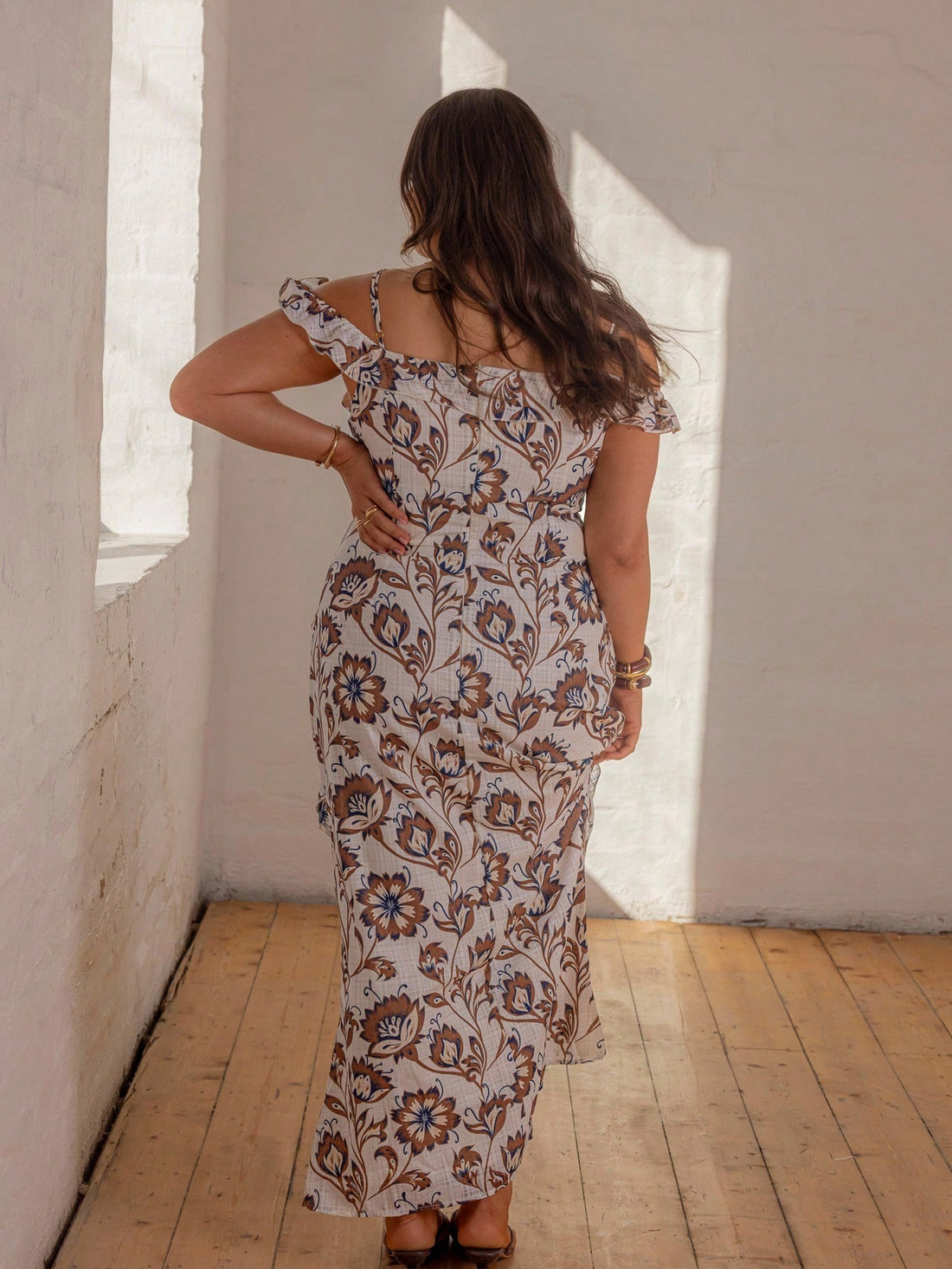 Turn heads on your next getaway with this Off-Shoulder Ruffle Maxi Dress. Its playful ruffles and flattering bodycon fit highlight your silhouette while keeping things breezy and fun. Perfect for beach strolls or sunset dinners, this dress brings vacation vibes wherever you go.