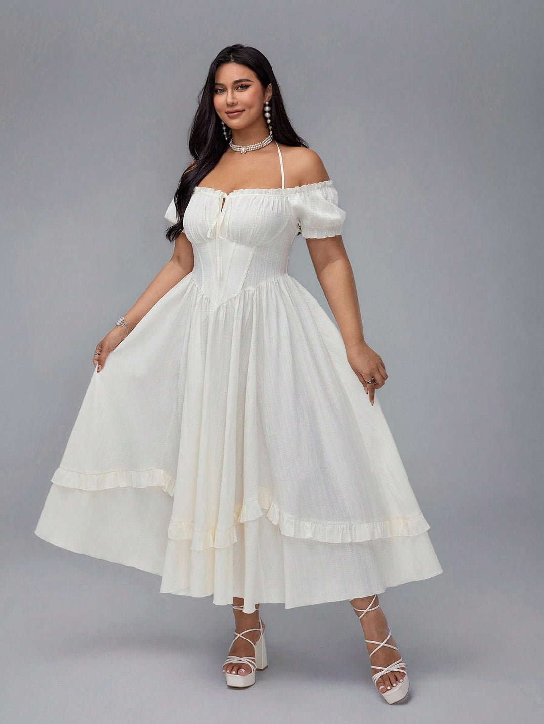 Step out in style with this playful plus size apricot dress, featuring a flirty off-shoulder neckline and charming puff sleeves. The bustier design highlights your curves, while the tie waist adds a touch of French-inspired elegance. Perfect for sunny days or special occasions, this dress combines comfort and chic flair effortlessly.