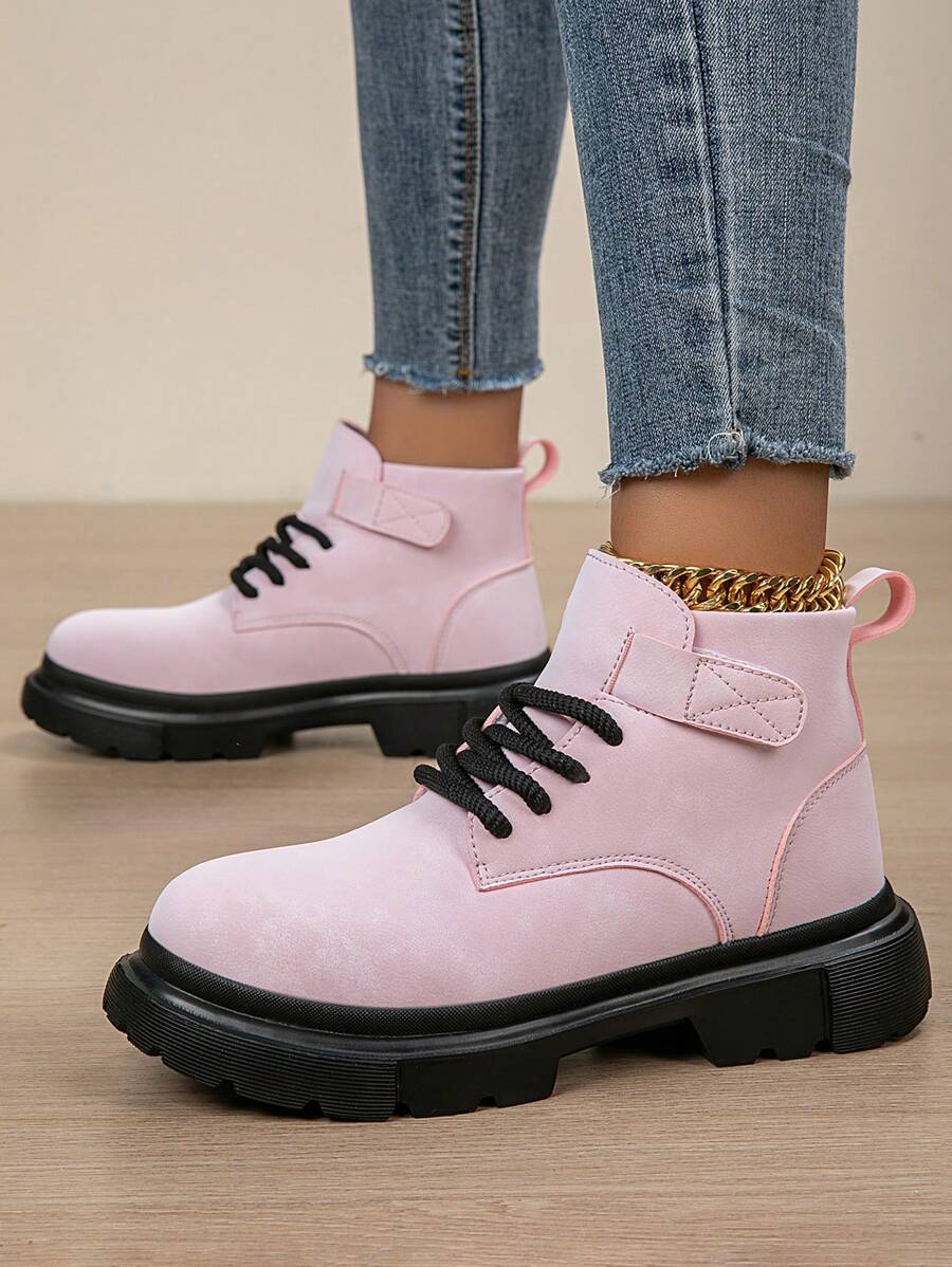 Step into fall with these Women’s Minimalist Lace-Up Combat Boots that blend edgy style and outdoor-ready comfort. Perfect for crisp autumn days, these ankle boots feature a sleek, minimalist design with sturdy laces for a secure fit. Whether you’re exploring the city streets or heading out on a weekend adventure, they add a playful twist to any outfit while keeping your feet cozy and confident. Embrace the season with boots that are as versatile as your plans!