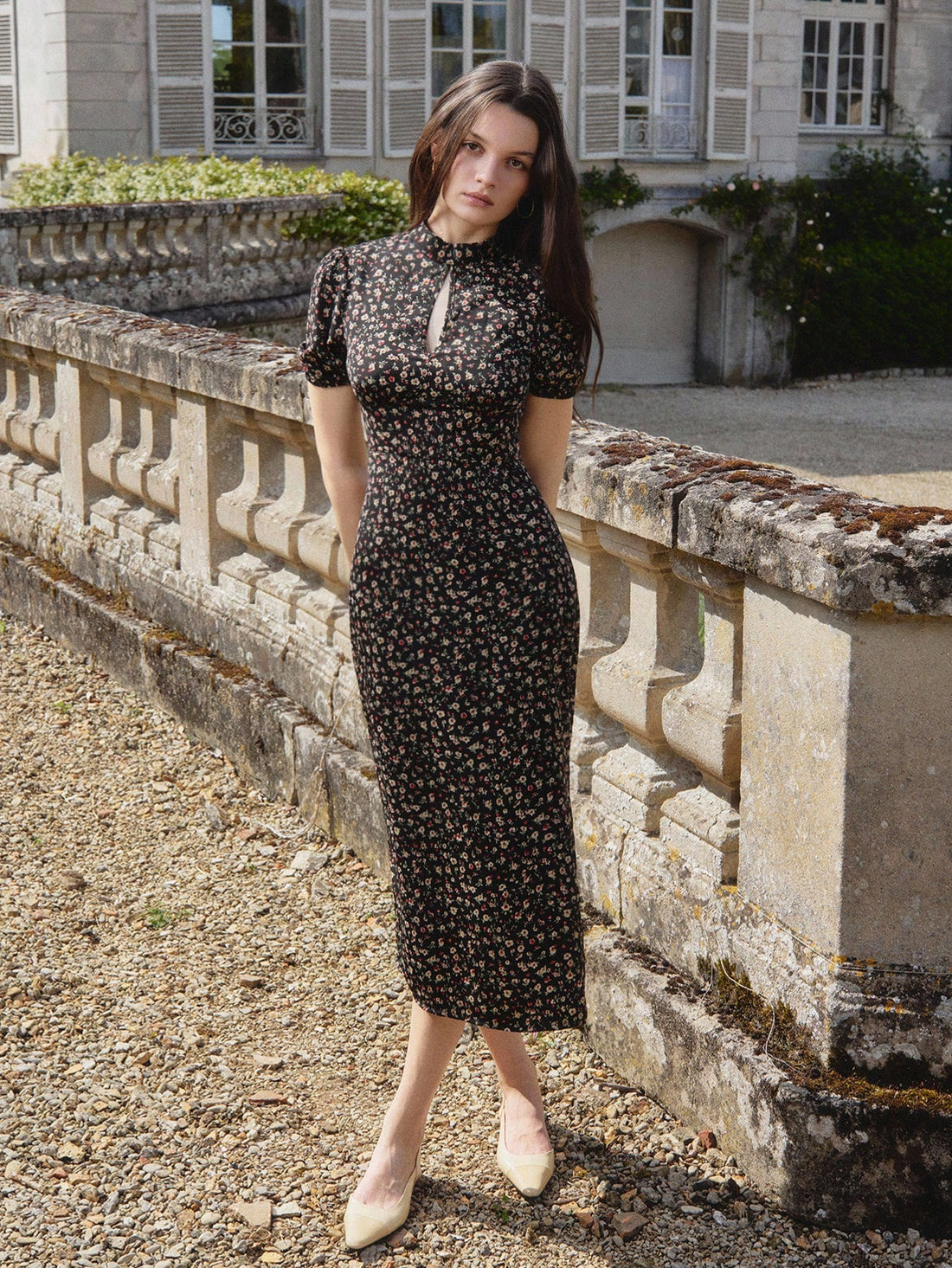 Elevate your wardrobe with this stunning vintage-inspired dress that effortlessly transitions from boardroom to celebration. The classic black base paired with delicate floral detailing creates an understated elegance, while the high neckline adds a touch of sophistication and polish. Perfect for making a memorable impression at the office or turning heads at homecoming, this piece proves that timeless style never goes out of fashion. Versatile, flattering, and undeniably chic—your new go-to dress awaits.