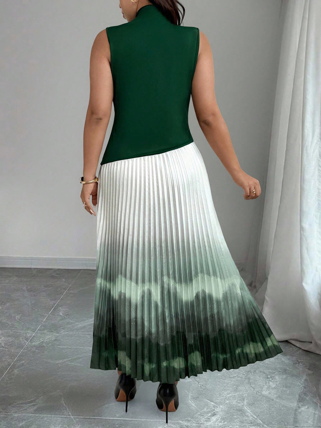 Step into vibrant charm with this Elegant Plus Size Tie Dye Gradient Pleated Patchwork Dress. Its playful blend of colors and flowing pleats create a flattering silhouette that moves with you. Perfect for turning heads effortlessly, this dress combines comfort and style for any occasion where you want to shine.