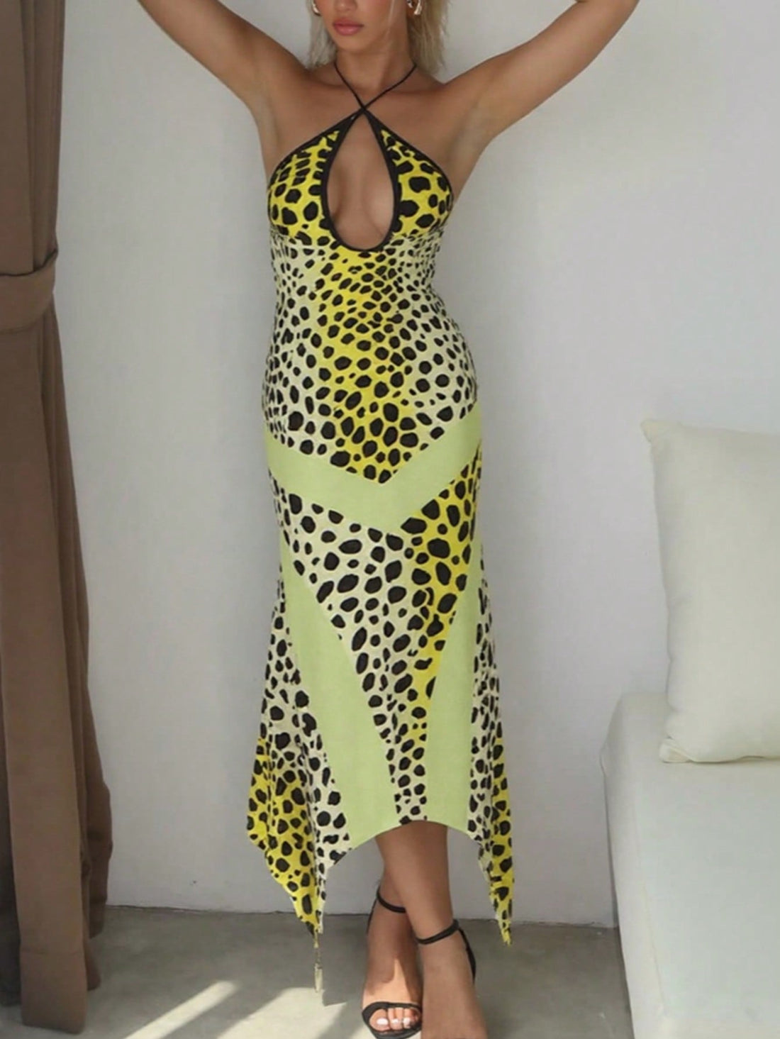 Turn heads this season in our Leopard Print Backless Halter Dress—the ultimate statement piece for those who dare to stand out. This sleek, form-fitting design features a daring backless cut and secure halter neckline that screams confidence and style. The classic leopard print adds an edgy, sophisticated touch perfect for summer nights out, beach parties, or anywhere you want to make a bold impression. Lightweight and flattering, it's your go-to dress for looking effortlessly chic while keeping cool.