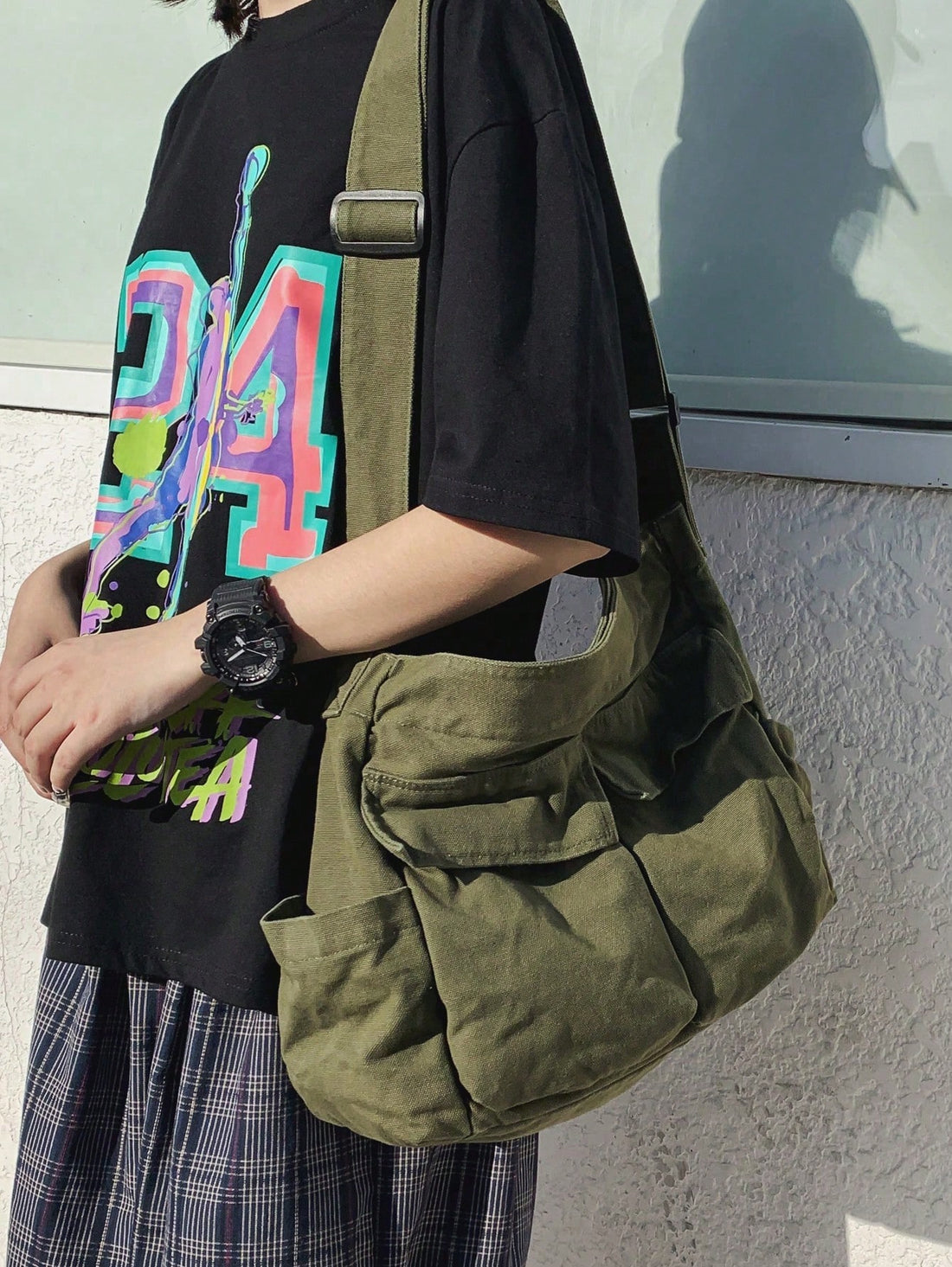 Designed for the modern student, this canvas crossbody bag merges Japanese and Korean aesthetic sensibilities with practical functionality. The spacious interior accommodates textbooks, laptops, and daily essentials, while strategically placed pockets keep smaller items organized and accessible. Crafted from durable canvas material, it withstands daily wear and develops character over time. The adjustable crossbody strap distributes weight evenly for comfortable all-day carry, whether navigating campus or c