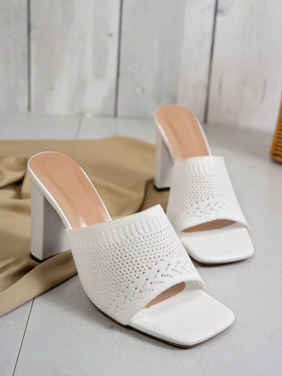 Step into summer fun with these vibrant orange open toe slide sandals! Designed with breathable materials and a stylish high heel, they keep your feet cool and fabulous during sunny outings. Perfect for adding a pop of color and a playful vibe to any warm-weather look.