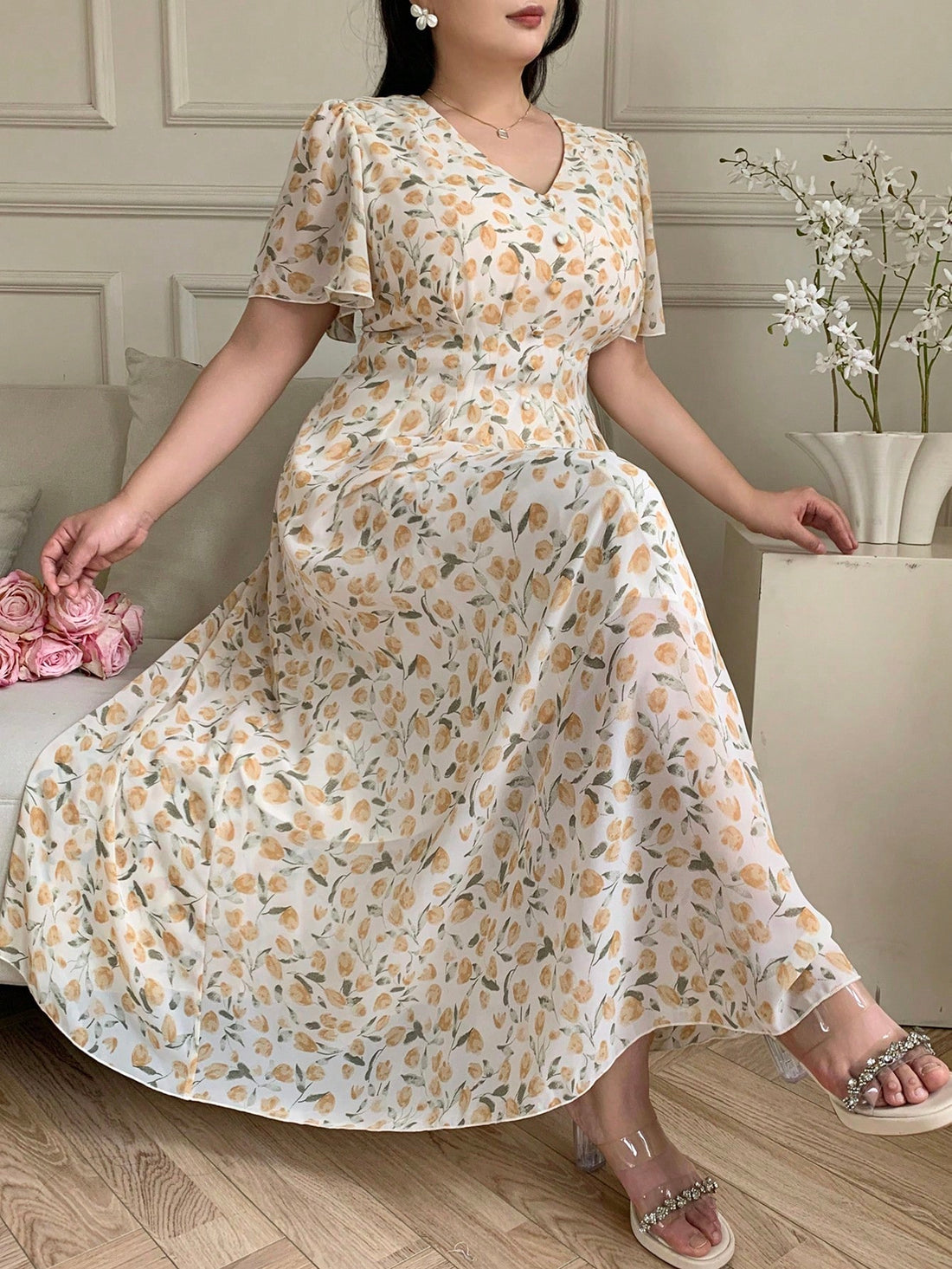 Get ready to twirl into summer with this Plus Size Floral Print Maxi Dress! Featuring a playful V-neck and flutter sleeves, it’s perfect for sunny days and breezy vacations. The flowing maxi length keeps you cool and comfortable while embracing your curves with a flattering fit. Floral fun meets easy elegance—your new go-to for carefree, stylish adventures.