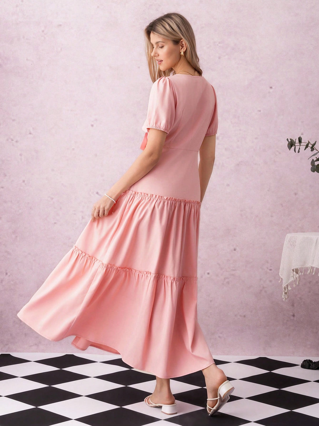 This charming puff sleeve dress adds a playful touch to your romantic dates and special occasions. Featuring a delicate bow detail that flirts with every move and a pleated hem that dances with elegance, it’s designed to make you feel both stylish and spirited. Perfect for moments when you want to shine with a hint of whimsy and a lot of grace.