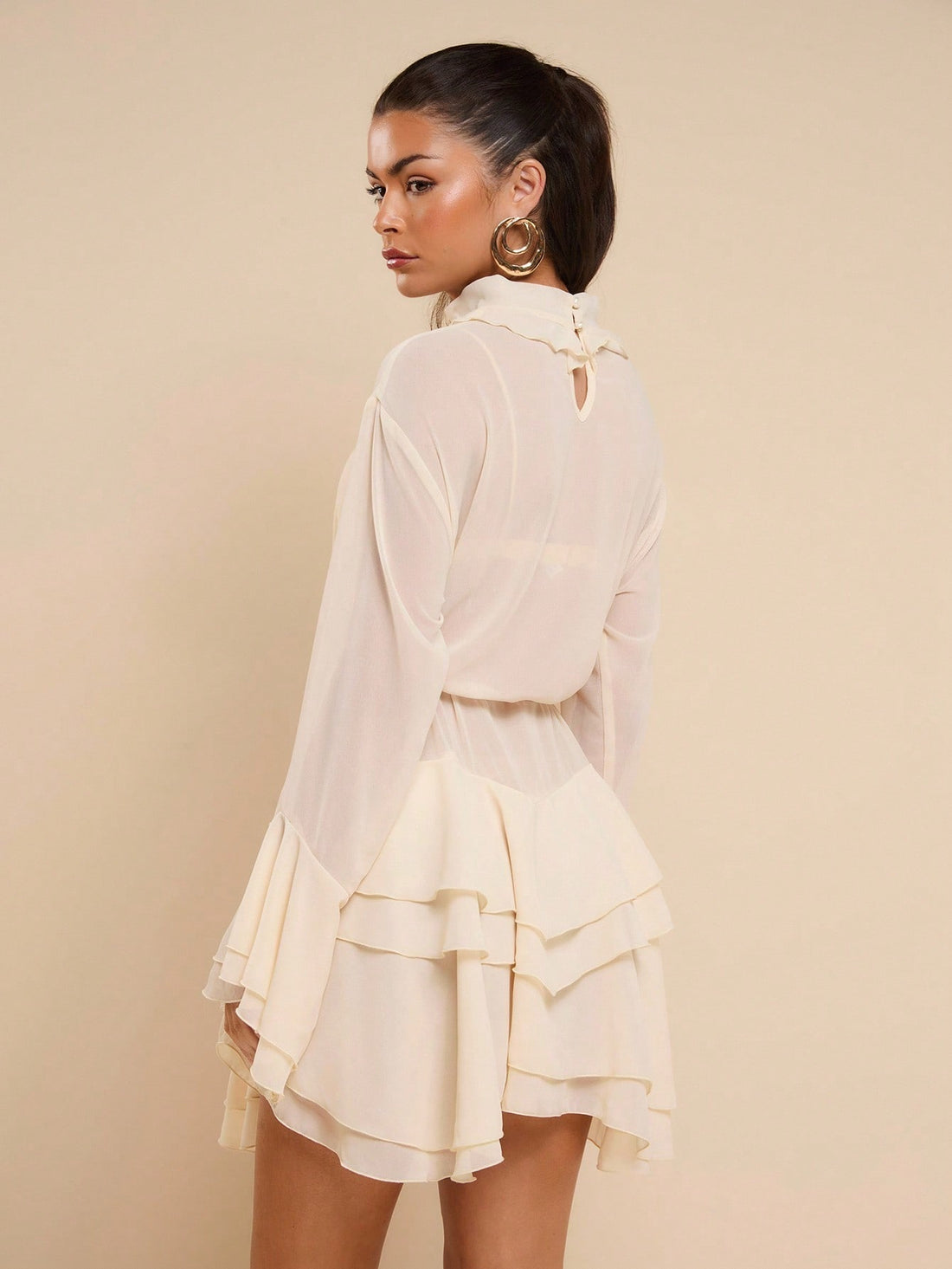 Twirl into vacation mode with this charming short dress featuring a delightful ruffle hem that adds movement and personality to every step. The elegant silhouette flatters your figure while keeping you cool and comfortable, whether you're exploring tropical beaches or enjoying crisp autumn getaways. Versatile enough for casual daytime adventures or dressed up for evening outings, this wardrobe essential transitions seamlessly through any season. Perfect for creating those Instagram-worthy vacation moments!