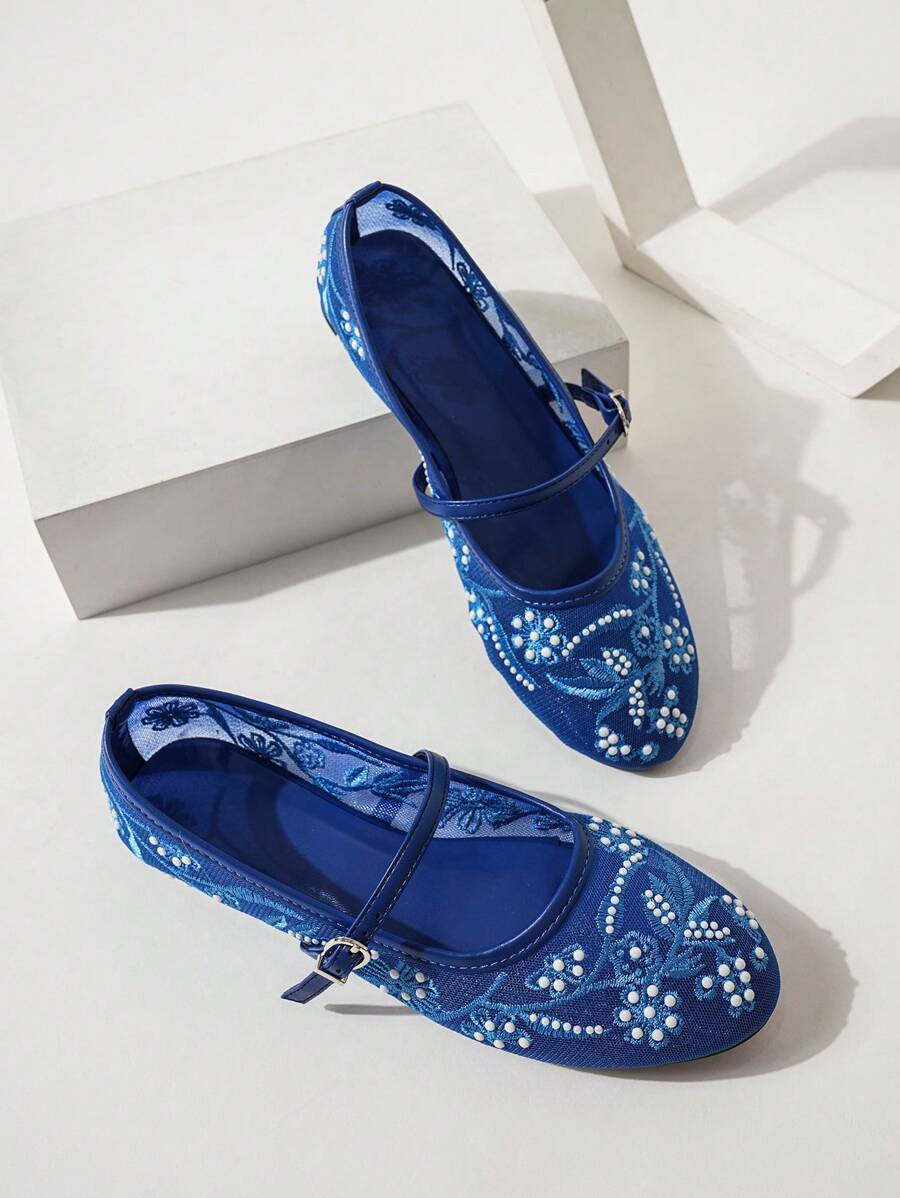 Step out in style with these Elegantly Embroidered Floral Pearl Ballerina Flats. Perfect for autumn, their vintage Mary Jane design adds a nostalgic charm while delicate floral embroidery and pearl accents bring a touch of whimsy. Slip them on for all-day comfort as you breeze through your daily adventures with playful elegance.