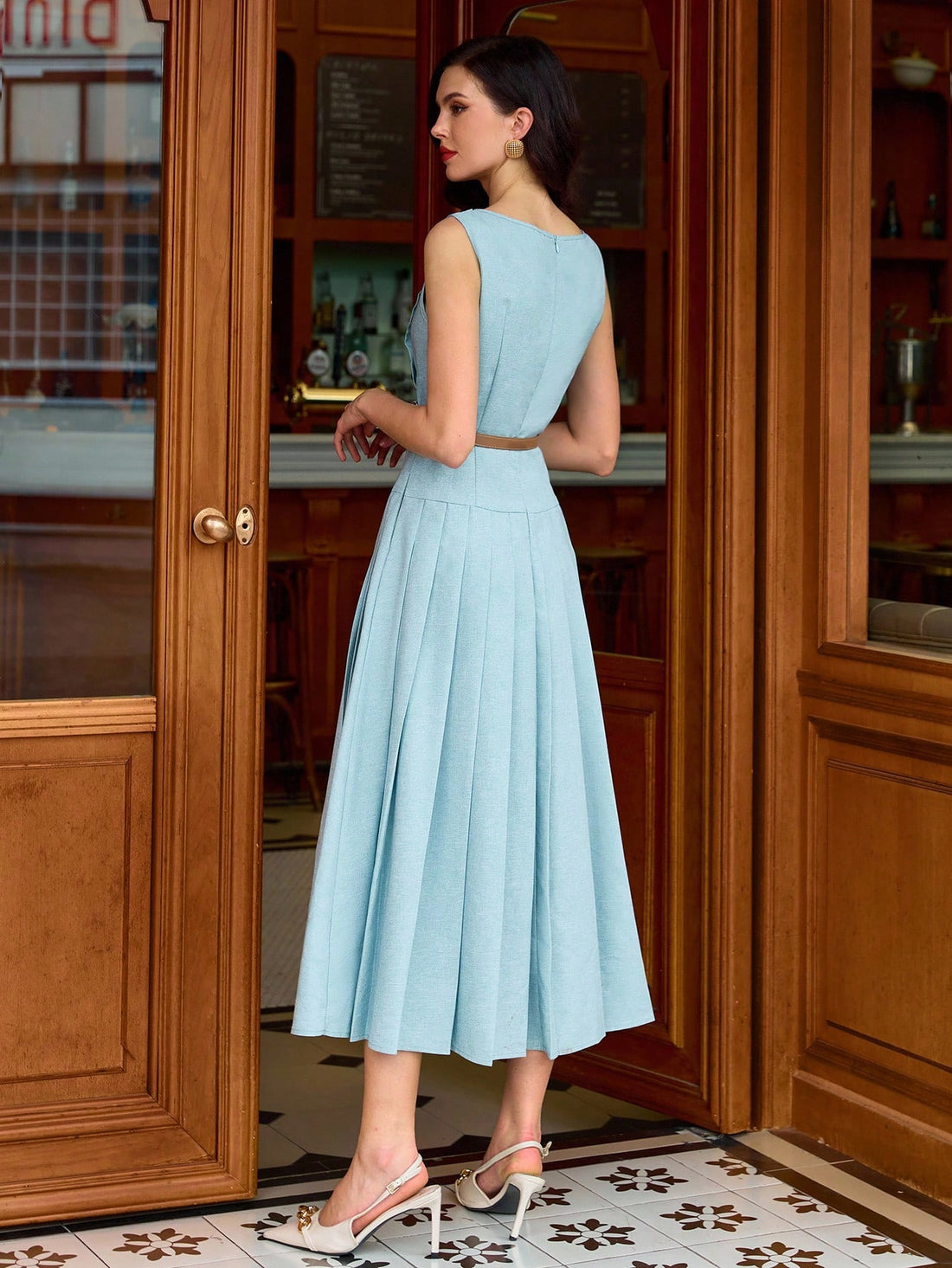 Step into timeless charm with this Elegant Vintage Pleated Midi Dress in a delightful baby blue. Its flowing pleats and classic midi length make it the perfect pick for sunny spring days, joyful weddings, or those back-to-school vibes. Light, breezy, and effortlessly chic—this dress adds a touch of whimsy to every occasion. Get ready to twirl through your day with vintage flair and playful elegance!