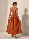 Back view rust maxi dress with crisscross tie straps and open back