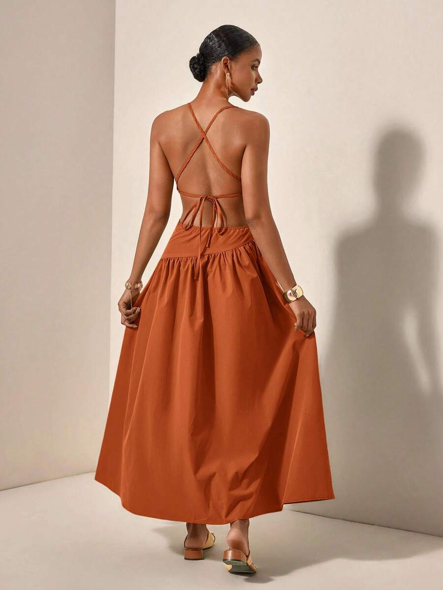 Back view rust maxi dress with crisscross tie straps and open back