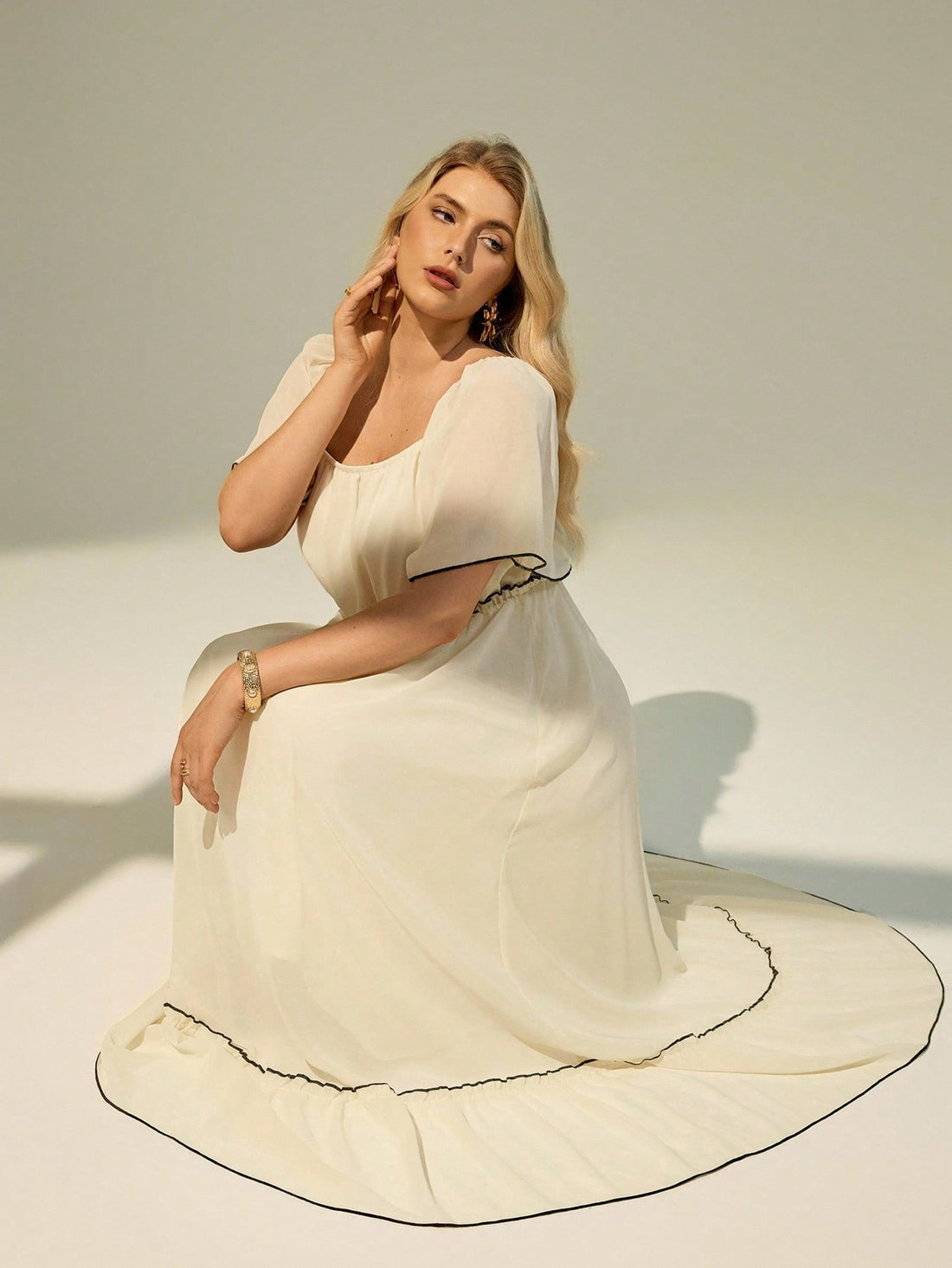 Twirl into summer with effortless grace! This stunning plus-size chiffon dress features delicate ruffle sleeves that add a touch of whimsy and movement to every step. The lightweight, breathable fabric keeps you cool and comfortable whether you're dancing at a wedding, strolling along the beach, or enjoying a casual day out. The flowing silhouette flatters beautifully while the soft chiffon drapes elegantly. From sunset celebrations to weekend adventures, this versatile dress is your go-to for looking fabul