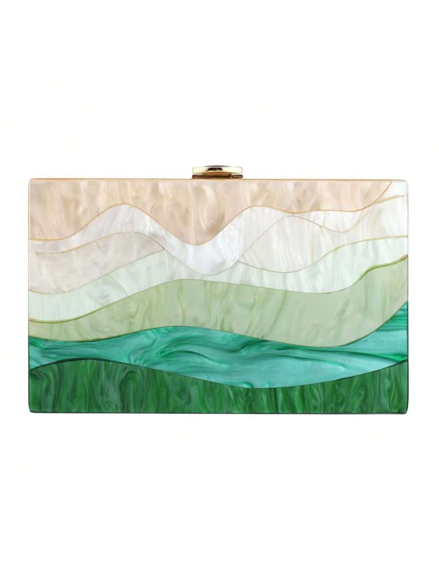 Brighten up your evening with this Colorful Geometric Acrylic Box Clutch! Featuring a playful mix of vibrant hues and sharp geometric shapes, this stylish purse adds a fun pop to any outfit. Its compact design fits essentials perfectly, while the sturdy acrylic gives it a modern, edgy vibe. Perfect for dancing the night away or making a statement at parties, this clutch mixes fashion with flair.