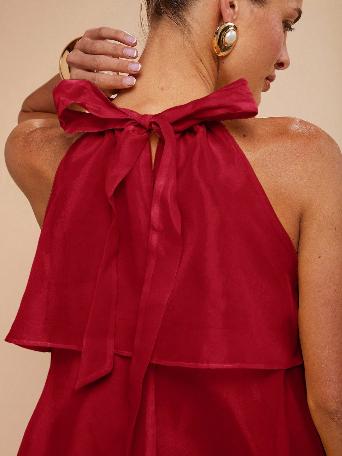 Slip into effortless summer glamour with this chic halter mini dress. Featuring a flattering solid color palette and timeless halter neckline, it's your go-to piece for warm-weather adventures. Whether you're heading to brunch, a beach party, or a casual night out, this versatile dress delivers style without the fuss. The mini length keeps things breezy and fun, while the sleek silhouette flatters every figure. Perfect for layering with sandals or statement jewelry to make it entirely your own.