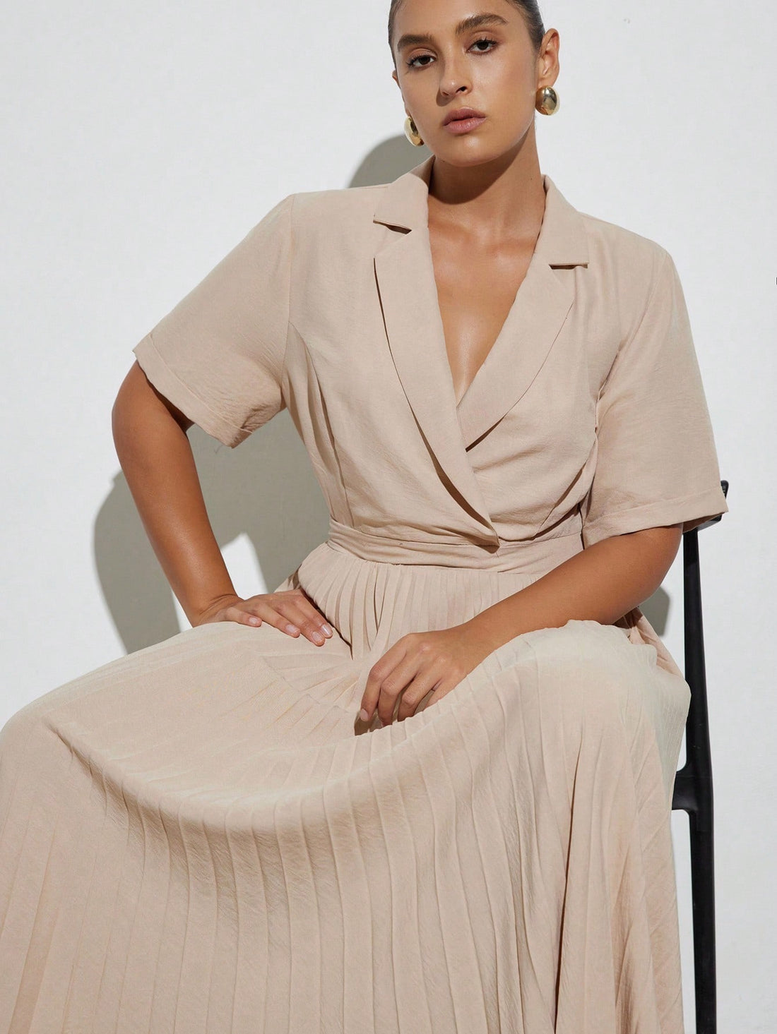 Step into the office with a dash of charm in this Elegant Minimalist Short Sleeve Dress. Its clean crew neck and playful pleated hem add a fun twist to classic simplicity, making it perfect for workdays that need a little extra flair. Comfortable and chic, it’s your new go-to for effortless style that means business.