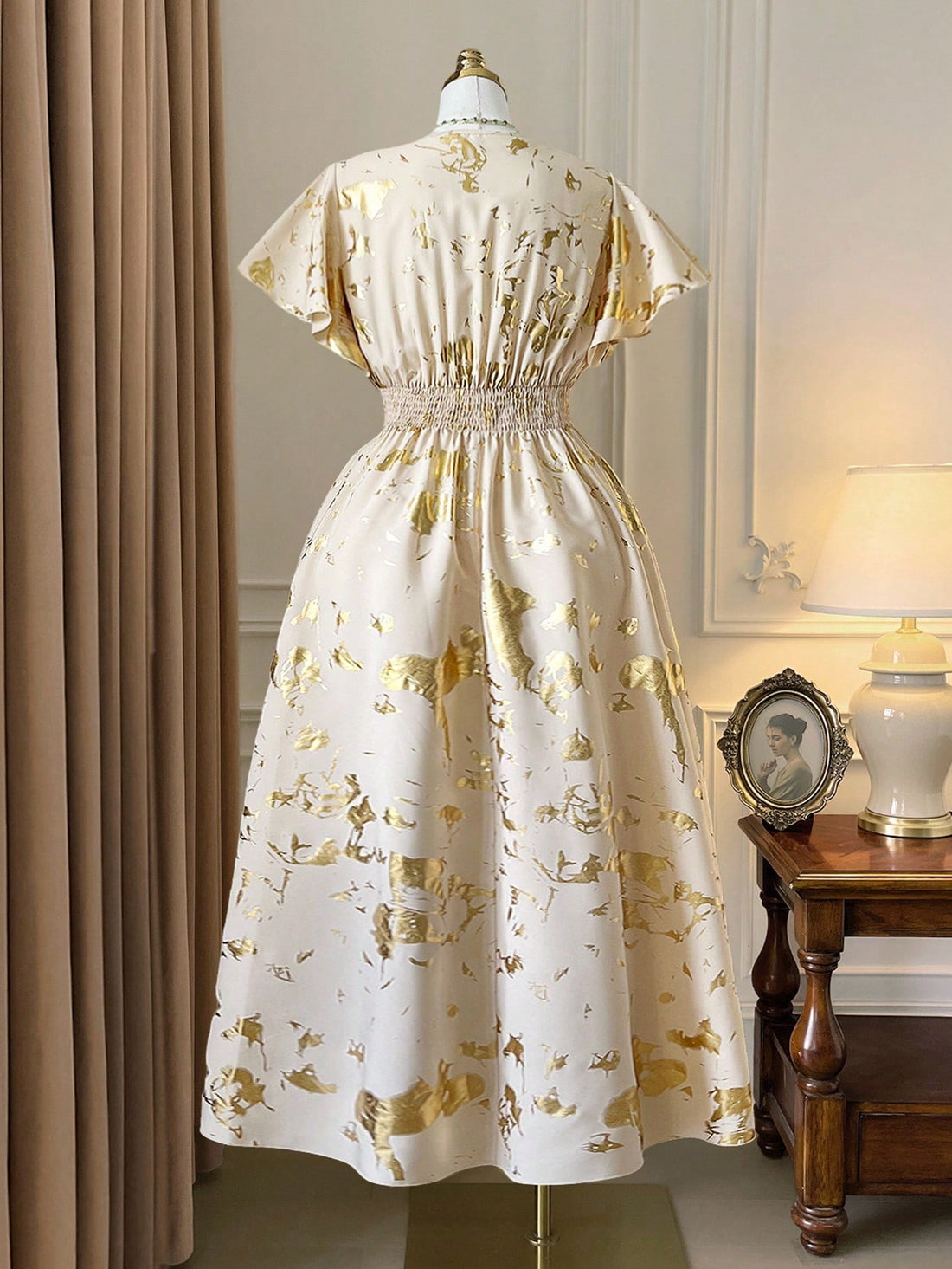 Turn heads on your commute with this playful plus-size long dress featuring a shimmering gold foil print. The overlap V-neck adds a flirty touch, while the ruffle hem brings fun movement to every step. Perfect for adding a dash of elegance and personality to your everyday style.