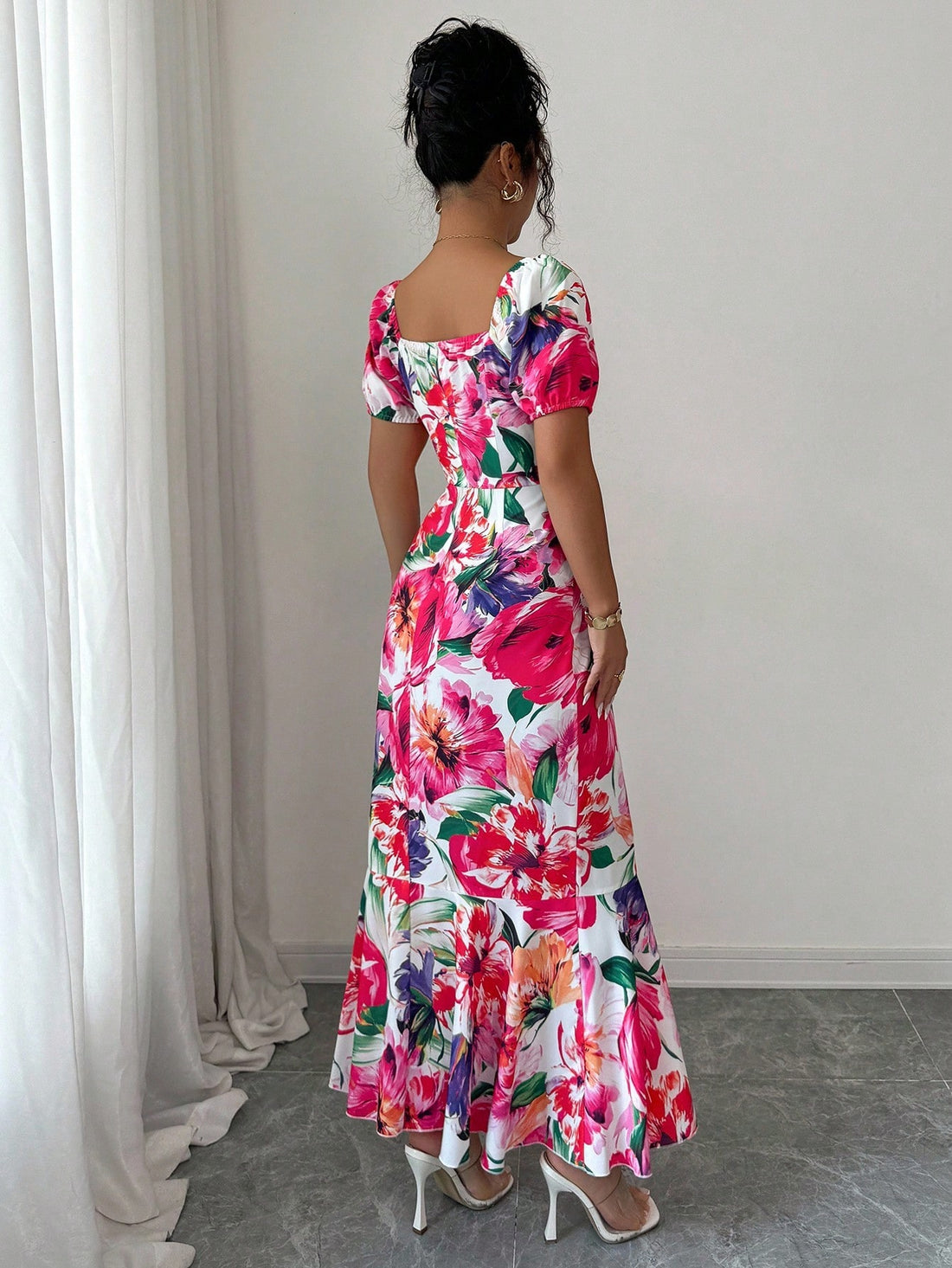 Twirl into any occasion in this show-stopping floral print dress! The charming puff sleeves add a touch of whimsy, while the square neckline frames your face beautifully. A graceful fishtail hem creates movement and elegance with every step. Perfect for lazy beach days, resort getaways, or casual outings where you want to look effortlessly chic. This versatile piece transitions seamlessly from day to night, making it your new go-to for any adventure that calls for a little extra flair.