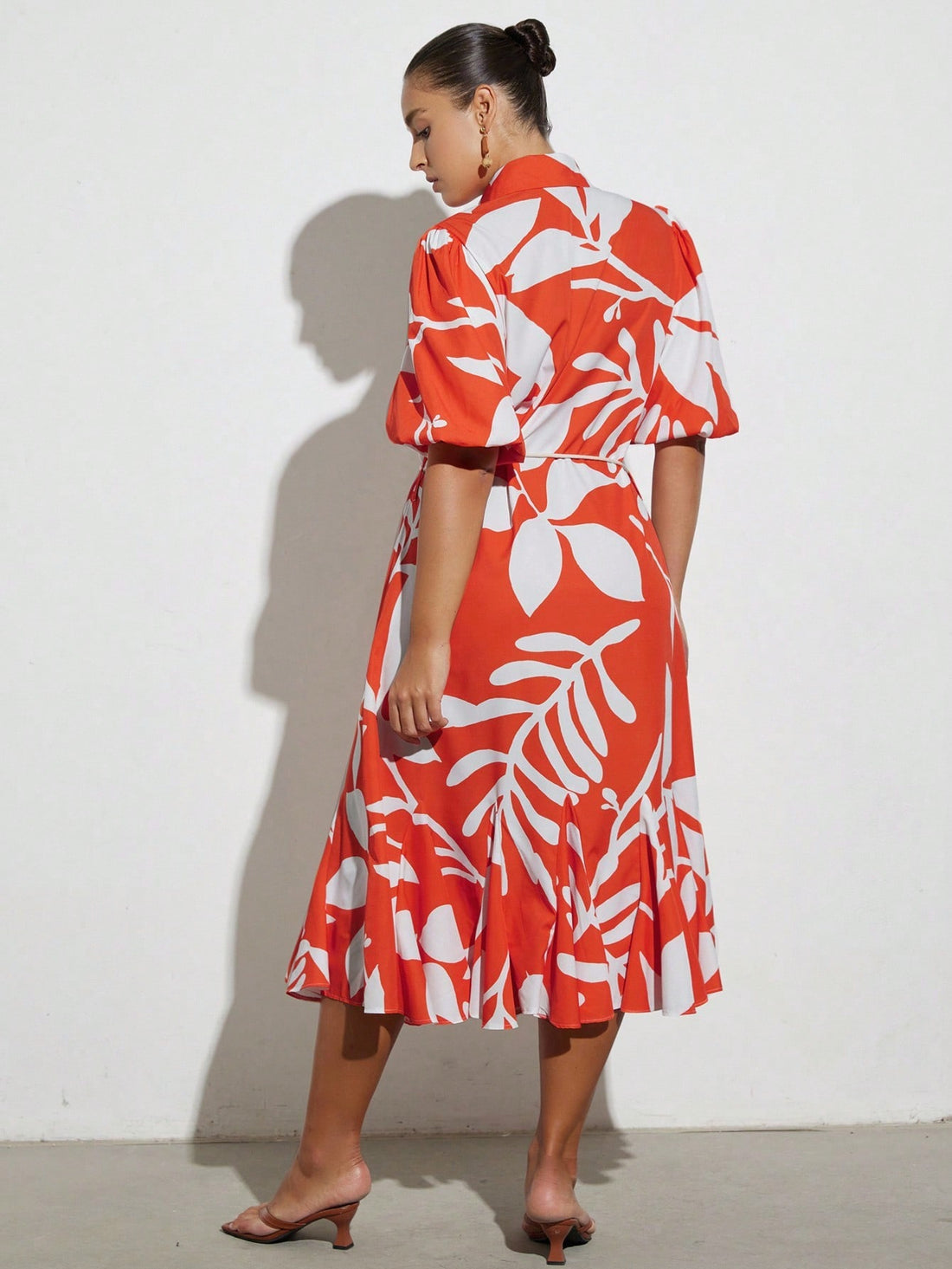 Step out in style with this playful French-inspired mini dress, featuring a charming floral print and a flattering cinched waist. The short sleeves add a breezy touch, making it perfect for sunny days or lively evenings. Effortlessly chic and fun, this dress brings a touch of Parisian flair to your wardrobe.