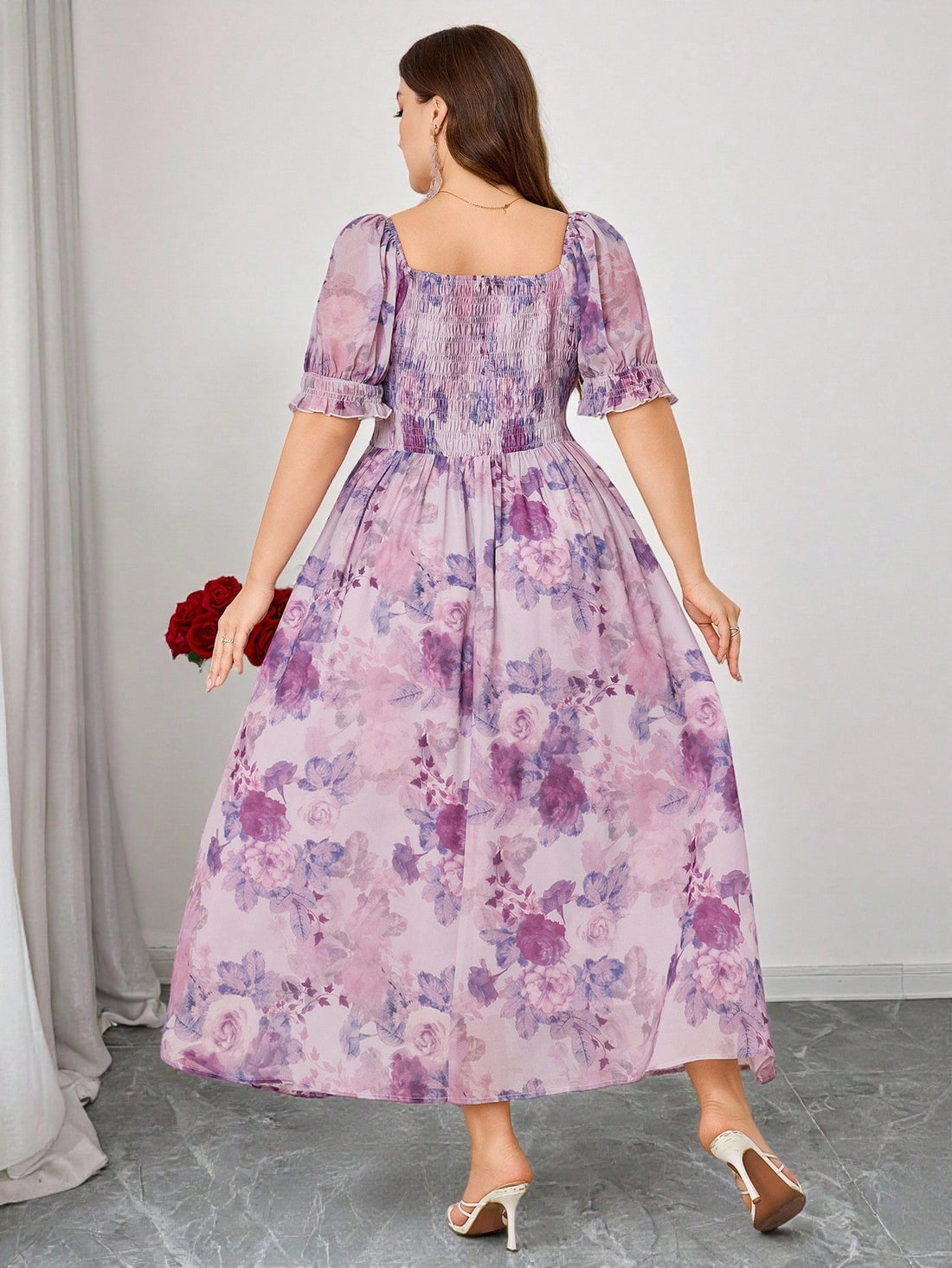Step into romance with this Elegant Plus Size Floral Chiffon Maxi Dress. Featuring a charming square neckline and a ruched waist that hugs your curves, this dress flows gracefully to create a dreamy silhouette. Perfect for romantic occasions, its soft chiffon fabric and delicate floral patterns make you feel like you’re floating on a cloud of floral bliss. Embrace elegance with a playful twist and celebrate your beauty in every twirl.