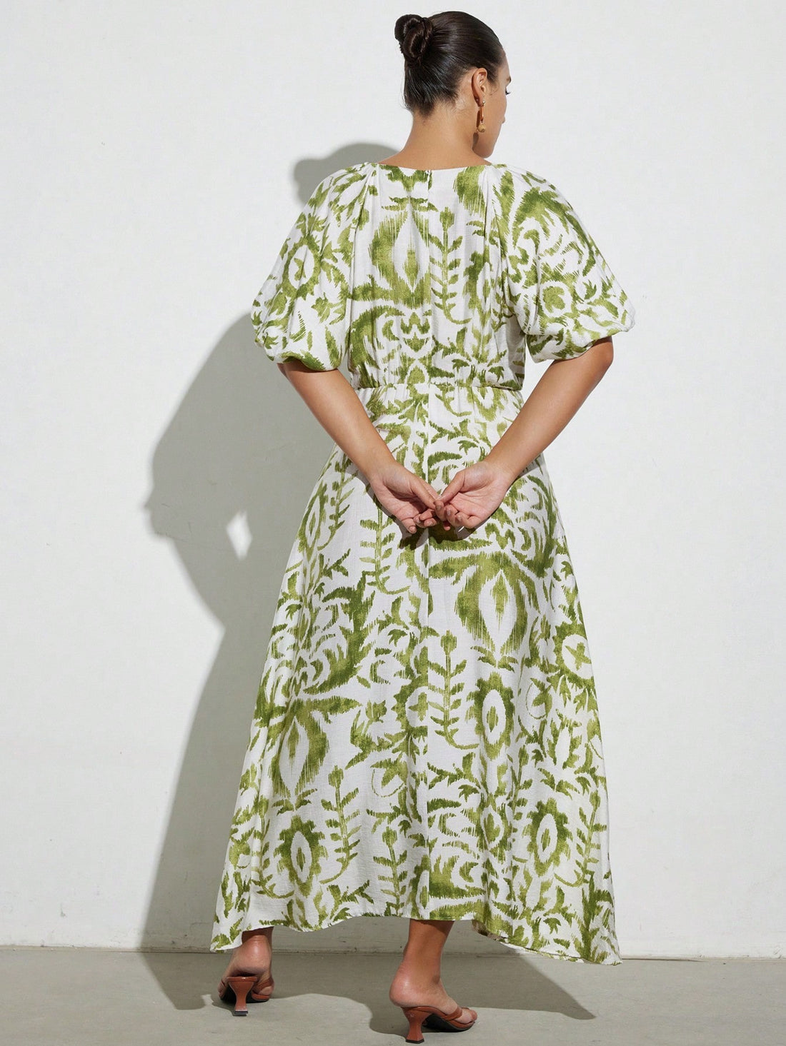 Step into sunshine with this playful green linen dress, adorned with charming plant prints that bring a fresh, natural vibe. Its relaxed fit ensures all-day comfort, perfect for breezy summer days or casual outings. Lightweight and breathable, this dress combines style and ease effortlessly, making it your go-to choice for warm-weather fun.