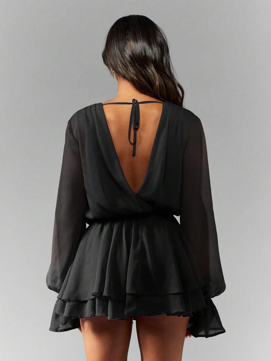 Turn heads effortlessly with this Elegant Chiffon Mini Dress featuring a chic cowl neck and playful ruffle skirt. Light and airy, it moves with you for a flirty vibe perfect for cocktail parties and evening events. Embrace fun elegance and steal the spotlight wherever you go!