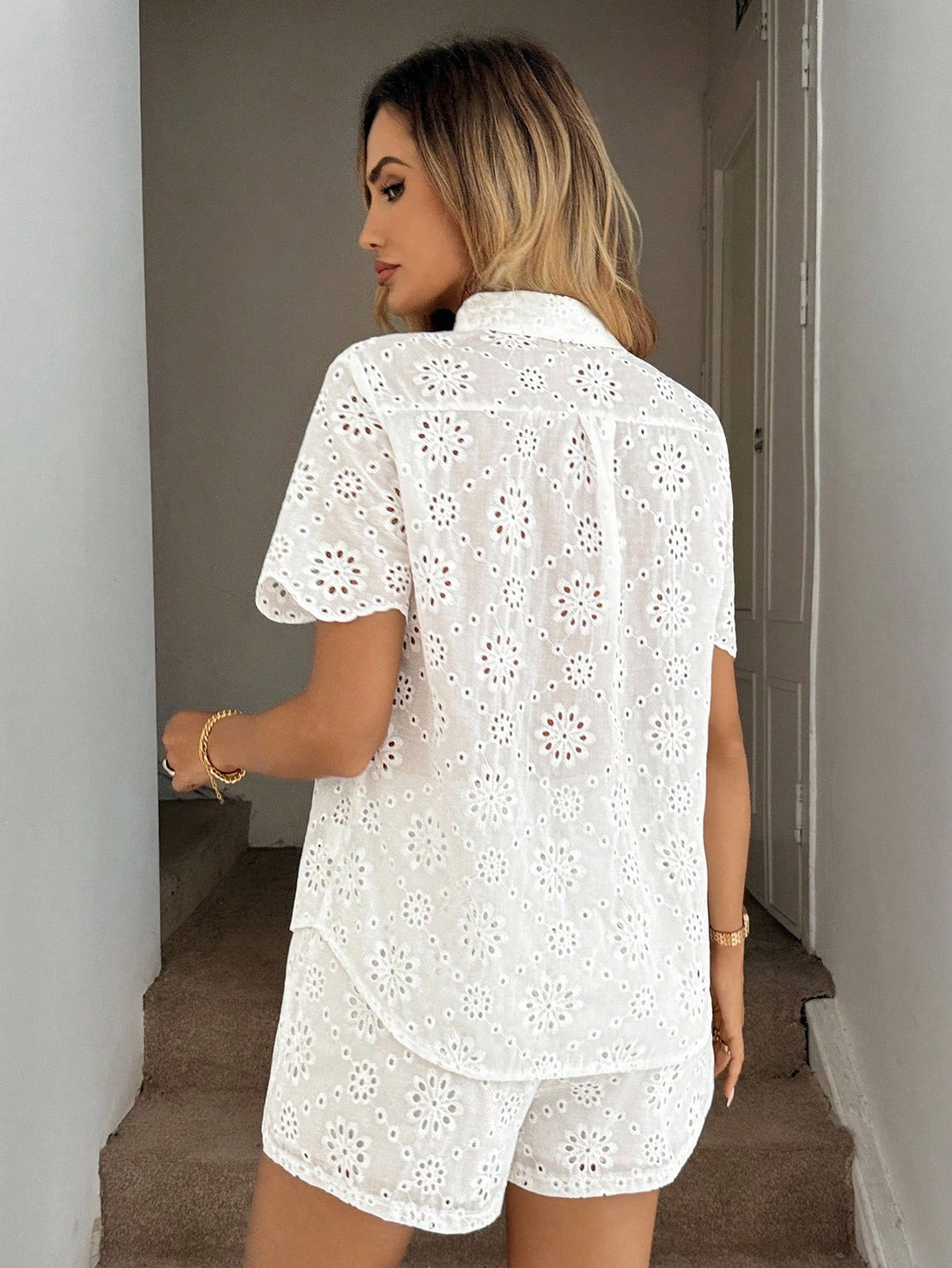 Escape the everyday in style with this charming two-piece set designed for the modern wanderer. The embroidered open-collar shirt brings effortless elegance with intricate detailing that catches the light, while the perfectly paired shorts feature practical pockets—because looking good shouldn't mean sacrificing function. Whether you're lounging by the pool, exploring a new city, or simply embracing vacation vibes at home, this outfit delivers comfort without compromising on flair. Mix, match, or wear toget