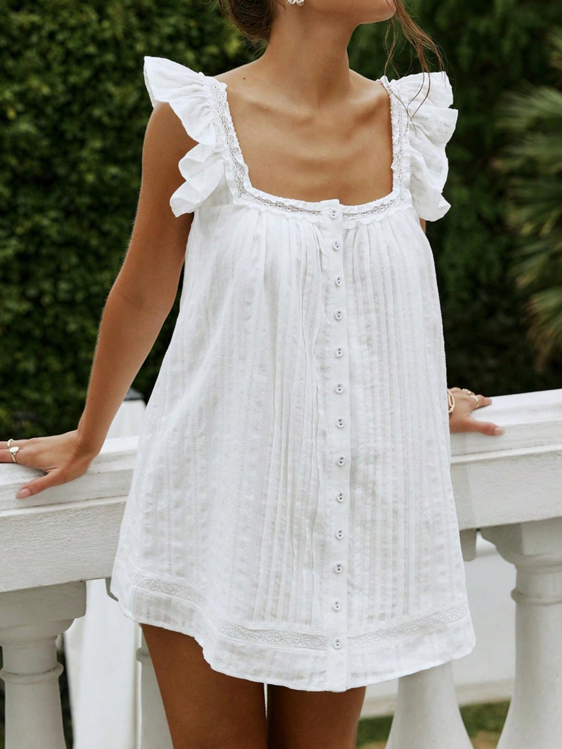 Step into the spotlight with this playful Y2K mini dress that screams vintage charm! Featuring a sleek solid-color cami silhouette, delicate lace patchwork details, and flirty ruffle trim, this dress is your go-to for summer parties and festival season. The mix of textures creates an effortlessly cool vibe that channels early 2000s nostalgia while feeling fresh and modern. Perfect for dancing the night away or making a statement at any gathering. Slip it on and let your style do the talking!