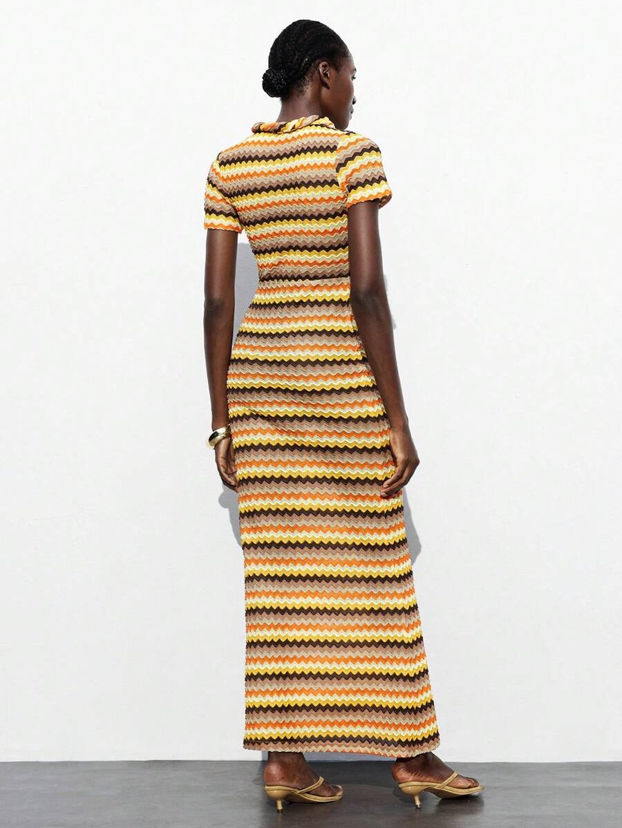 Step out in style with this Chic Multicolor Striped Maxi Dress, designed to brighten up autumn and winter days or add flair to your vacation wardrobe. Its vibrant stripes bring a playful pop of color, while the flowing maxi silhouette offers comfort and effortless elegance. Perfect for layering or wearing alone, this dress keeps your look fresh no matter the season.