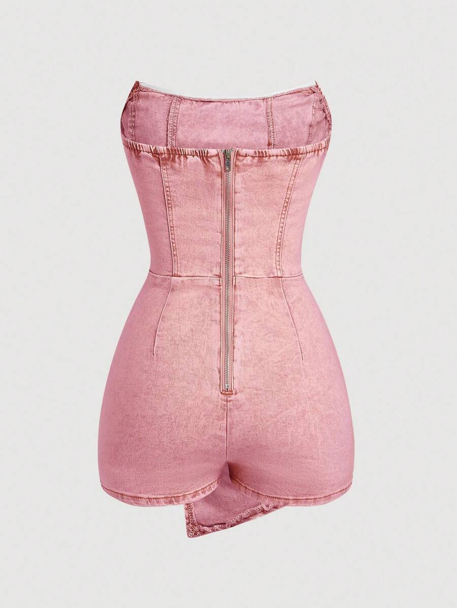 Washed pink strapless denim romper front with corset seams and wrap overlay