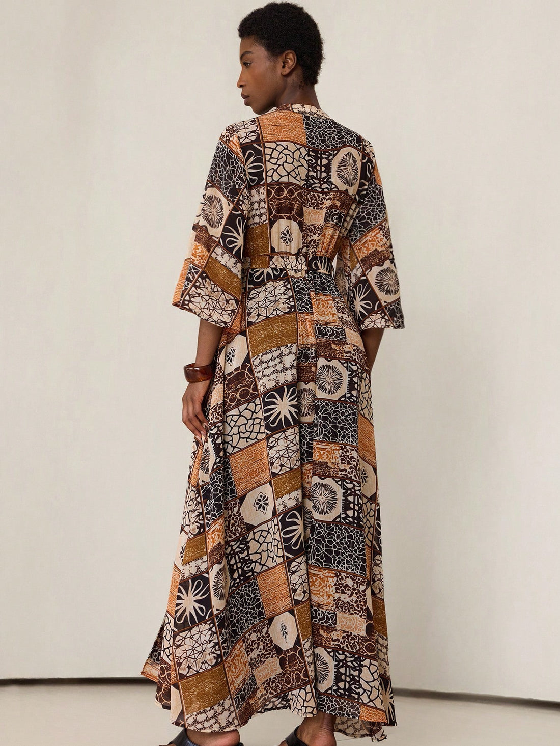 Step into effortless charm with this Bohemian Elegance midi dress. Featuring a flirty high-low hem that dances with every step and a chic stand collar, it’s designed to highlight your waist with a flattering cinch. Perfect for twirling at festivals or turning heads on casual days, this dress brings playful sophistication to your wardrobe. Embrace the breezy freedom and stylish flair all in one beautiful piece!