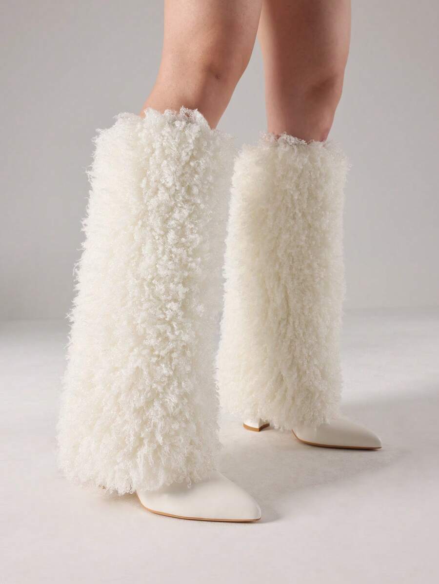 Step out in style with these chic knee-high faux fur boots designed just for women who love comfort and flair. Featuring a pointed toe and chunky heels, they add a playful edge to any outfit while keeping your feet cozy and supported. Perfect for turning heads and staying warm all day long!