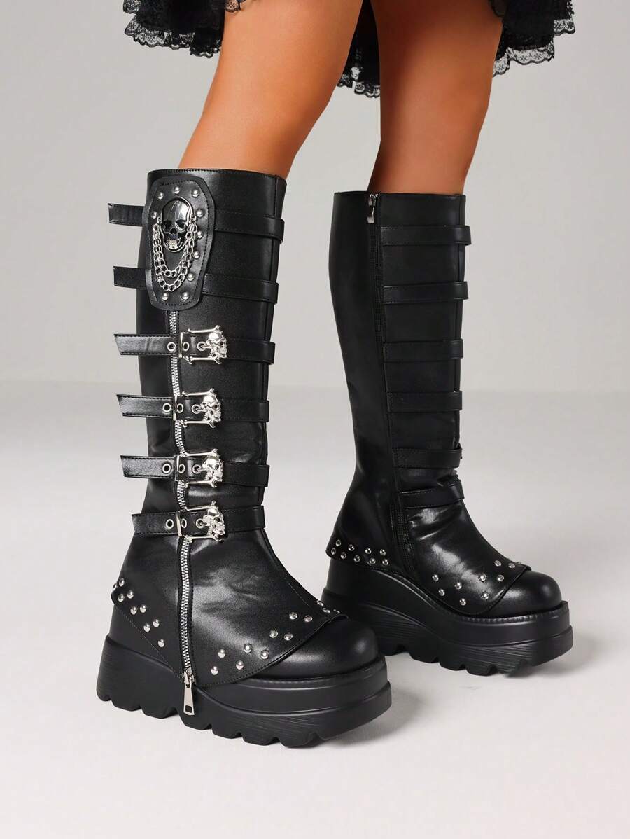 Step into bold style with these Y2K Goth Knee High Boots for Women. Featuring punk-inspired skull buckles, edgy chains, and towering platform wedge heels, they bring a rebellious twist to any outfit. Perfect for making a statement, these boots combine fierce attitude with standout comfort. Elevate your look and own the night with every step!