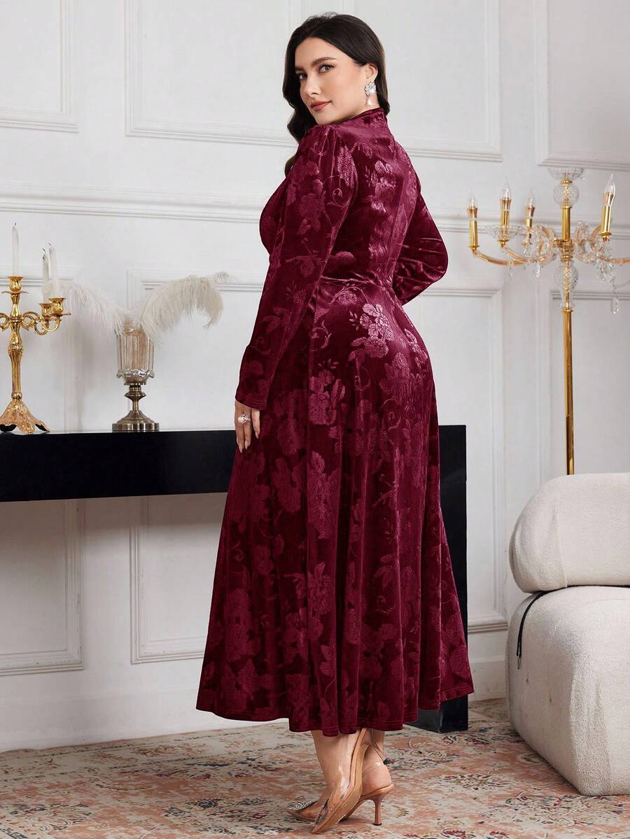 Step into the spotlight in this stunning floral jacquard evening dress that celebrates your curves with effortless grace. The romantic V-neckline flatters while voluminous puff sleeves add a touch of whimsy and dimension. Crafted from luxurious jacquard fabric, this plus-size beauty features an intricate floral pattern that catches every eye in the room. Perfect for galas, weddings, or any occasion where you want to feel absolutely fabulous. Slip it on and let your confidence shine as bright as you do.