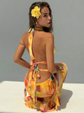 Orange halter maxi dress with ruffle drape