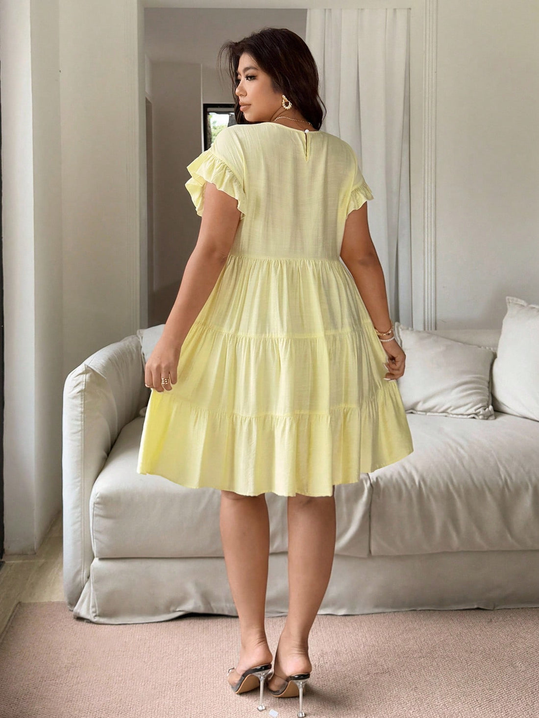 Bask in sunshine vibes with this playful plus size yellow dress, featuring charming ruffles that add flirtatious movement. Perfect for casual vacations or romantic getaways, it blends comfort with effortless style to brighten your day and elevate your mood wherever you go.