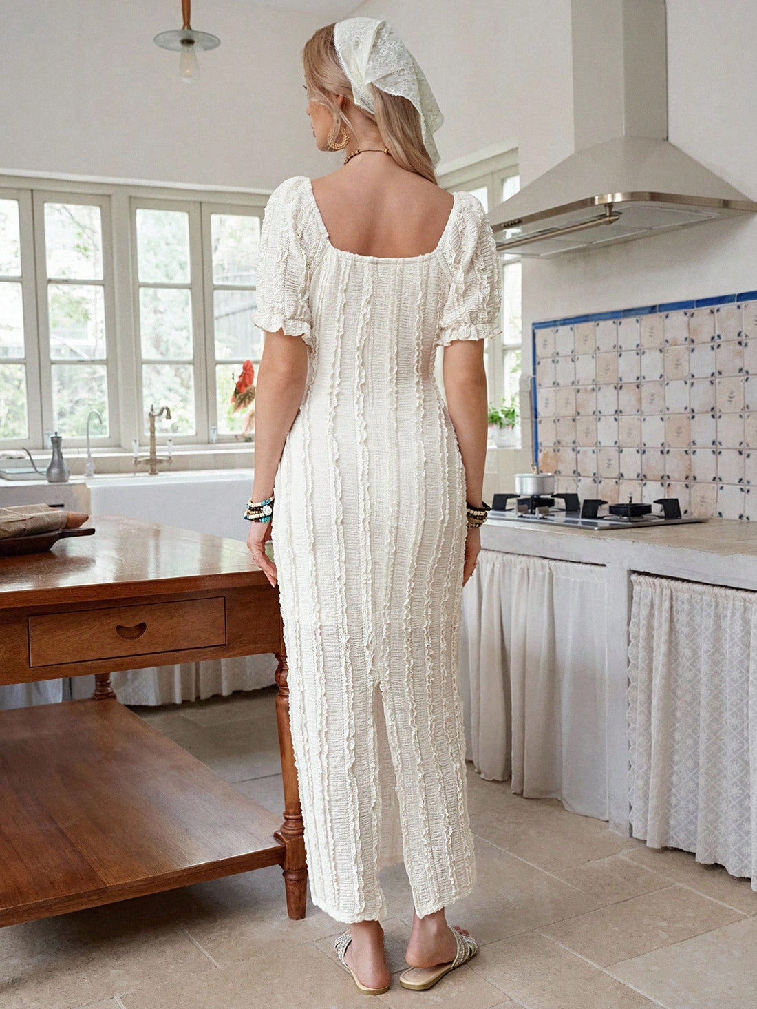 Slip into timeless elegance with this stunning long dress that effortlessly turns heads. Featuring romantic puff sleeves and a charming ruffle hem, this solid-color beauty strikes the perfect balance between sophisticated and fun. The flowing silhouette flatters every figure while the classic design works for everything from dinner dates to special occasions. Whether you're dressing up or keeping it casual, this versatile piece becomes an instant wardrobe favorite that makes getting ready a breeze.