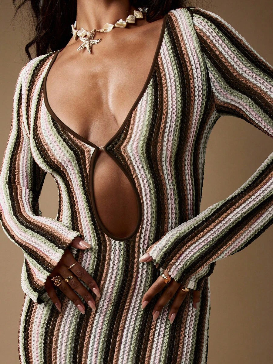 Step into the spotlight with the Retro Stripe Knit Midaxi Dress, your go-to for winter holiday parties and resort vibes. Its cozy knit fabric keeps you warm while the playful stripes add a splash of vintage charm. The midaxi length offers a flirty, flowing silhouette that's easy to dance in all night. Perfect for mixing festive cheer with laid-back glamour!