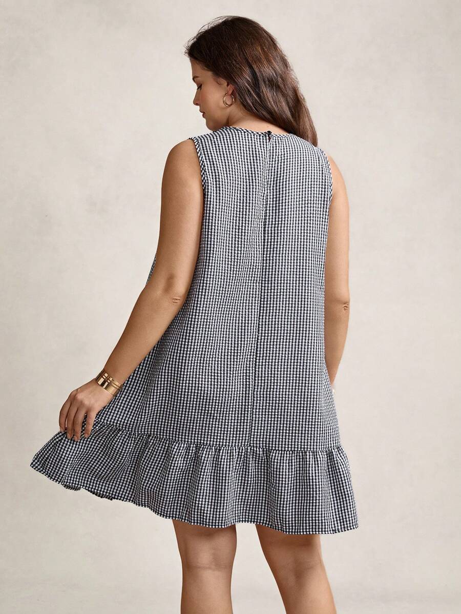 Step out with flair in this Chic Plus Size A-Line Dress, designed to celebrate your curves with a playful twist. The ruffled hem adds flirty movement while the retro geometric print brings a dash of vintage charm. Perfect for casual daytime fun or dressing up for elegant evenings, this dress makes style effortless and fun. Embrace your bold side and let your wardrobe do the talking!