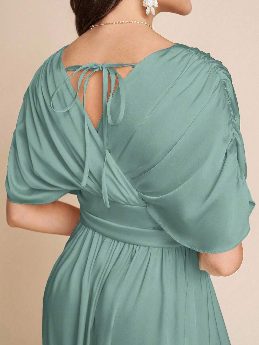 Step into effortless charm with this Elegant Women's V-Neck Wrap Dress. Its apricot A-line silhouette flatters every figure, while the soft crepe fabric ensures comfort through all seasons. Perfect for casual brunches or dressy nights out, this versatile wrap dress adds a splash of playful elegance to your wardrobe. Whether twirling at a party or owning the office, this dress has you covered with style that feels as good as it looks.