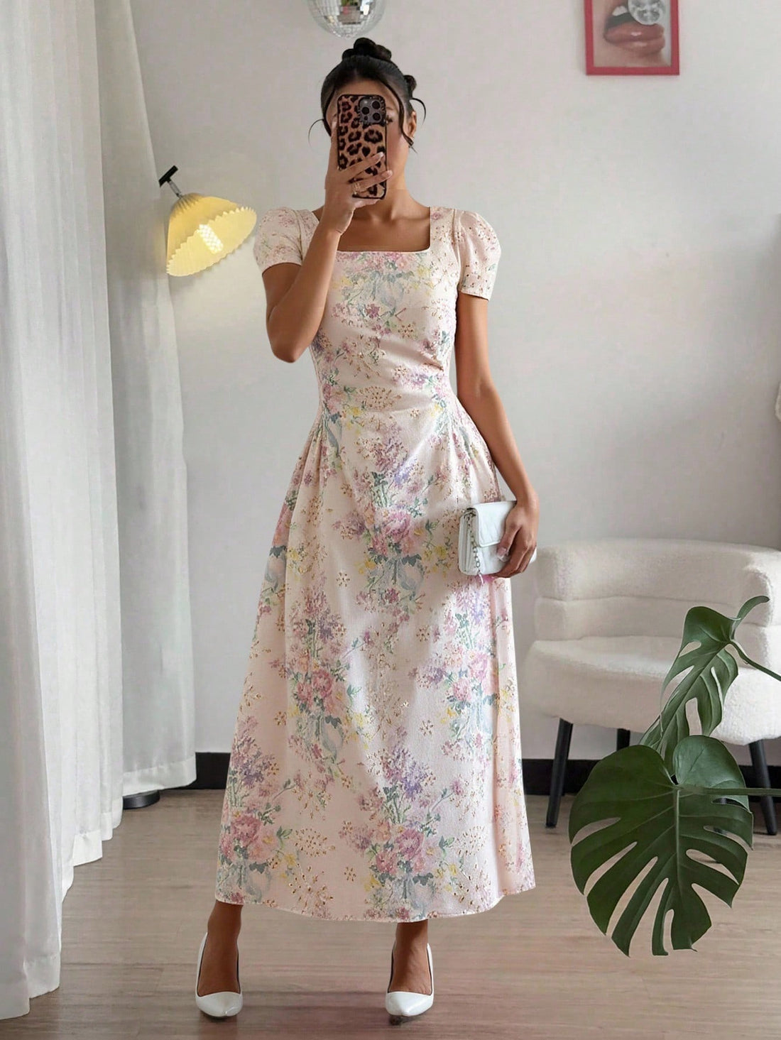 Step out in style with this playful mid-length dress featuring a charming hollow out waist design that adds a flirty twist to your look. The elegant print brings a fun vibe to any occasion, making it perfect for daytime adventures or evening fun. Comfortable yet eye-catching, this dress invites you to express your cheerful spirit with every step.