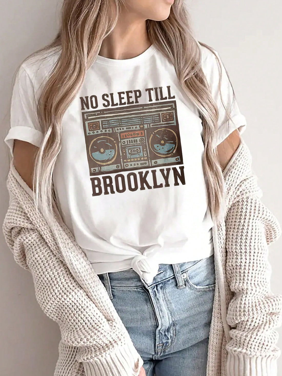 Rock your style with this Retro Punk Rock "Don't Sleep Until Brooklyn" T-Shirt, featuring a bold boombox design perfect for women who love casual, edgy fashion. Its playful vibe makes it a standout piece for day or night, adding a fun, rebellious touch to any outfit. Comfortable and cool, it’s your go-to tee for making a statement wherever you go.