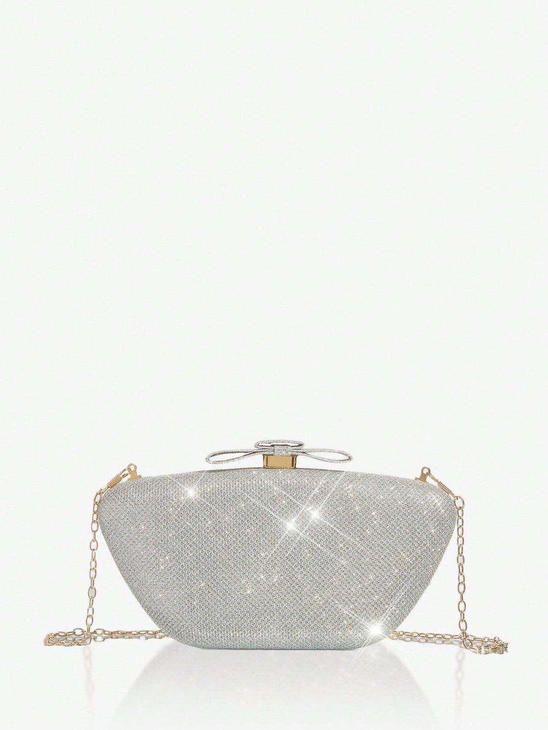 Make a statement with this dazzling clutch purse that's ready to steal the spotlight at any occasion. Crafted with a lustrous finish that catches the light beautifully, this glamorous handbag brings instant sophistication to your ensemble. Whether you're heading to an evening event or a night out with friends, its sleek silhouette and eye-catching shine ensure you'll turn heads wherever you go. The perfect size for essentials, this clutch pairs effortlessly with dresses, gowns, or chic outfits. Embrace your