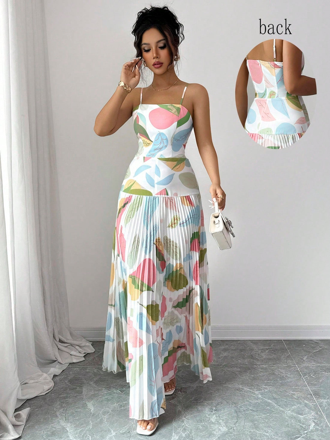 Slip into effortless sophistication with this stunning spaghetti strap maxi dress! Designed to turn heads at holiday parties, weddings, and those moments when you want to feel absolutely fabulous, this dress combines timeless elegance with modern flair. The delicate straps frame your shoulders beautifully while the flowing maxi silhouette creates a graceful, flattering look that works for any body type. Whether you're dancing the night away or making a grand entrance, this versatile piece transitions seamle