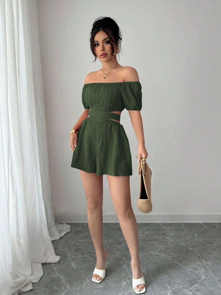 Split front and rear views of green off-shoulder romper showing open waist and tied bow