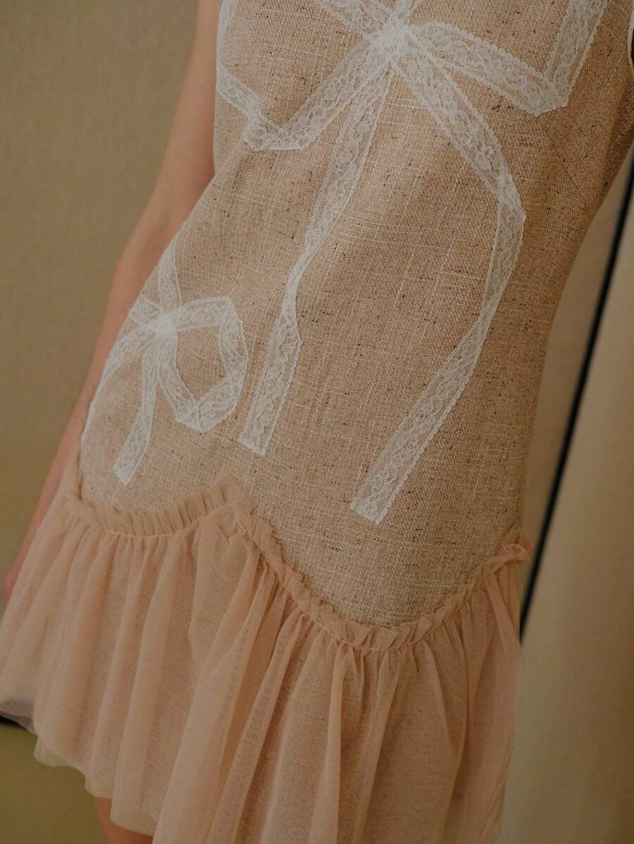 Turn heads in this playful sleeveless short dress, featuring a charming contrast lace bow pattern that adds a touch of whimsy. The flared hem creates a fun, flirty silhouette perfect for any occasion where you want to shine and move with grace. Easy to wear and full of personality, this dress brings elegance with a spirited twist.