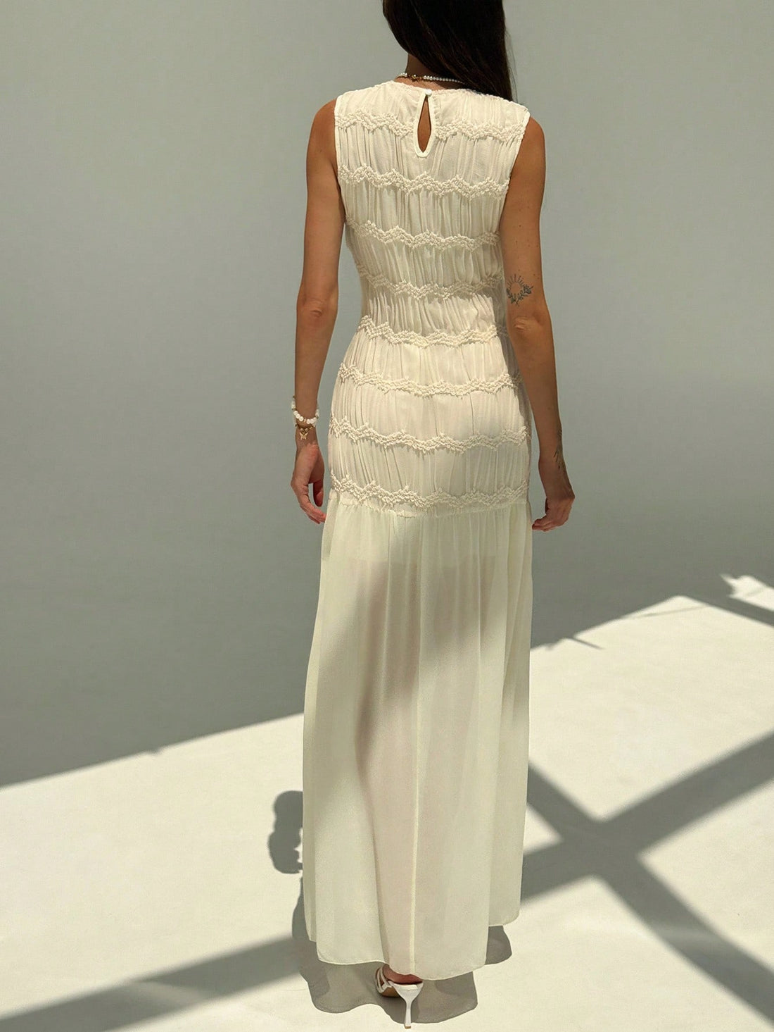 Turn heads with this Elegant Women's Sleeveless Mesh Patchwork Dress. Featuring a chic solid color and a flattering round neck, its playful mesh patchwork adds a flirty twist to any occasion. Lightweight and breezy, it’s perfect for dancing the night away or sparkling at your next summer party.