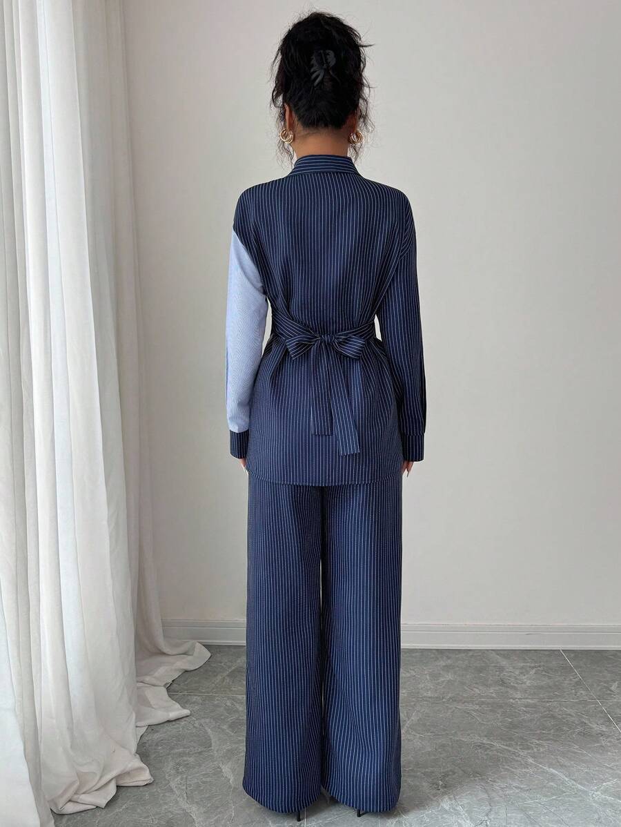 Elevate your seasonal wardrobe with this chic 2-piece outfit that effortlessly blends style and comfort. Featuring bold striped color blocking and a flattering fitted silhouette, this set transitions seamlessly from spring breezes to autumn adventures. Mix and match the pieces for endless styling possibilities, or wear them together for a coordinated look that turns heads. Whether you're heading to brunch, running errands, or catching up with friends, this versatile duo keeps you looking put-together and fe