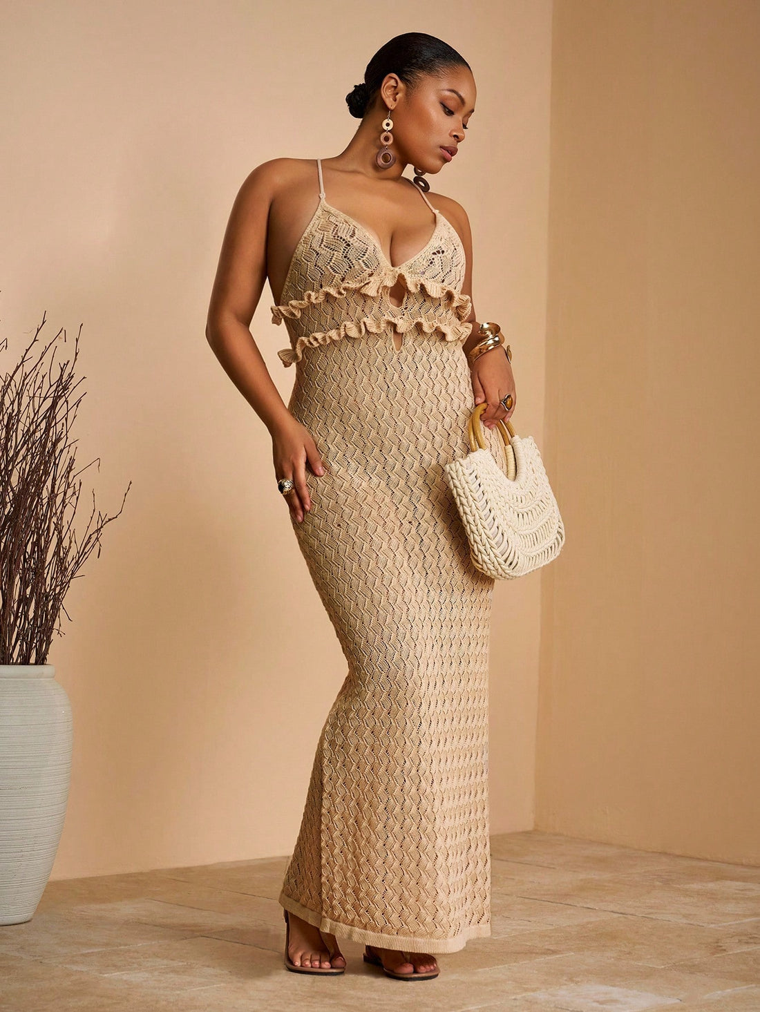 Step into summer with this playful yet elegant sleeveless apricot knit maxi dress. Its breezy fabric and flattering silhouette make it your go-to for sun-soaked vacations, romantic evenings, or those special moments that call for a touch of charm. Effortlessly stylish and comfortable, this dress brings warmth and whimsy to every occasion.