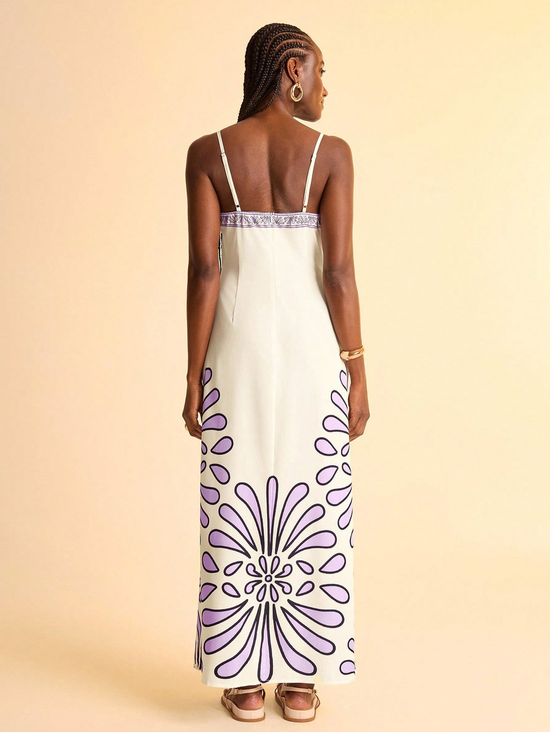 Step into effortless paradise with this Boho Chic Tropical Purple Maxi Cami Dress. Its flowing silhouette and vibrant purple hues bring retro resort vibes to your everyday look, perfect for beach strolls or sunset cocktails. Lightweight and breezy, this dress promises comfort while turning heads with its playful tropical charm. Let your free spirit shine in carefree style wherever you go.